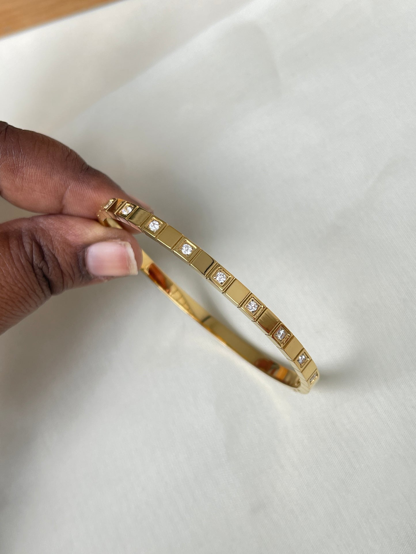 10 stone square gold bracelet