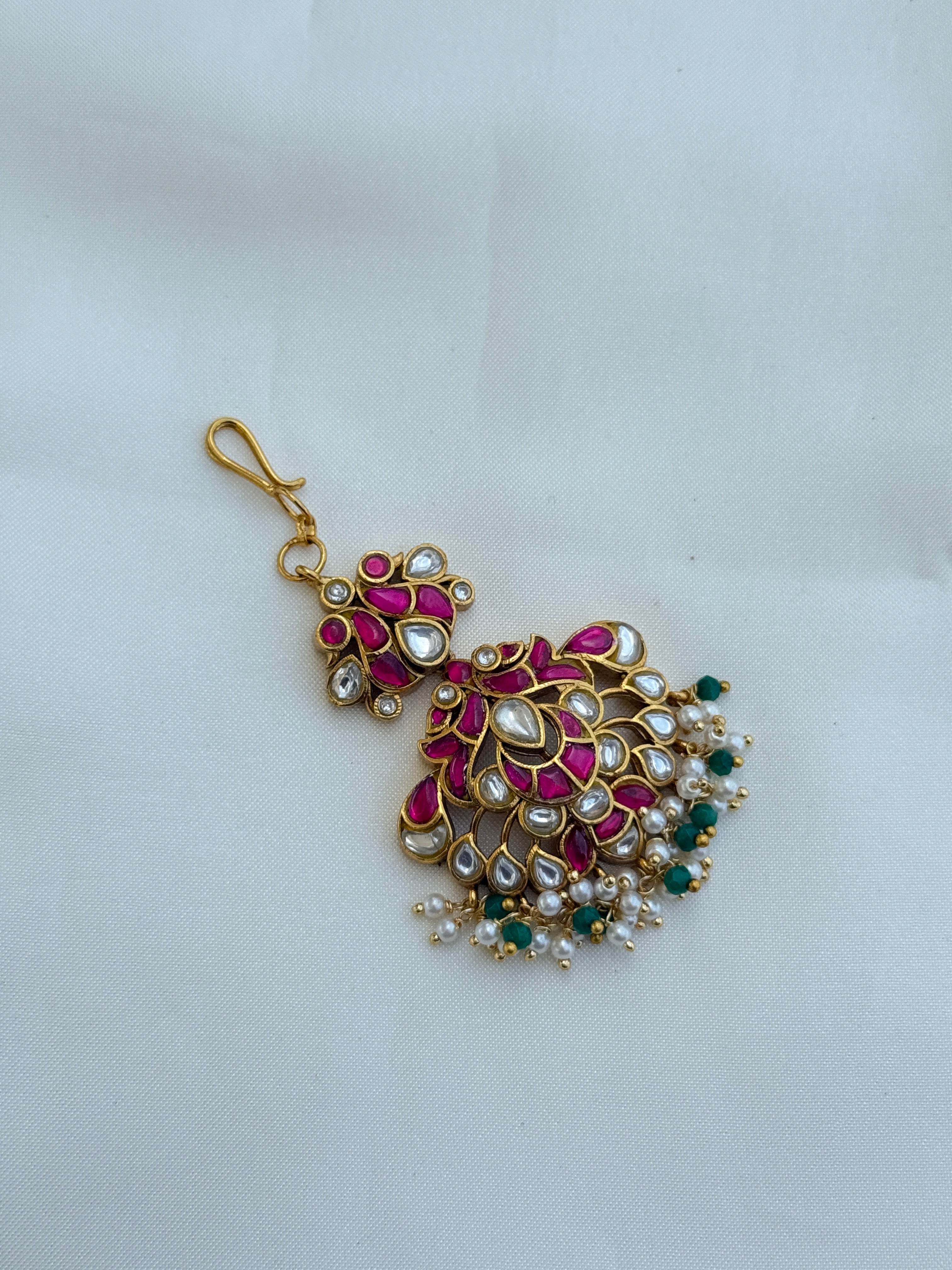 Tk554 jadau kundan peacock tikka