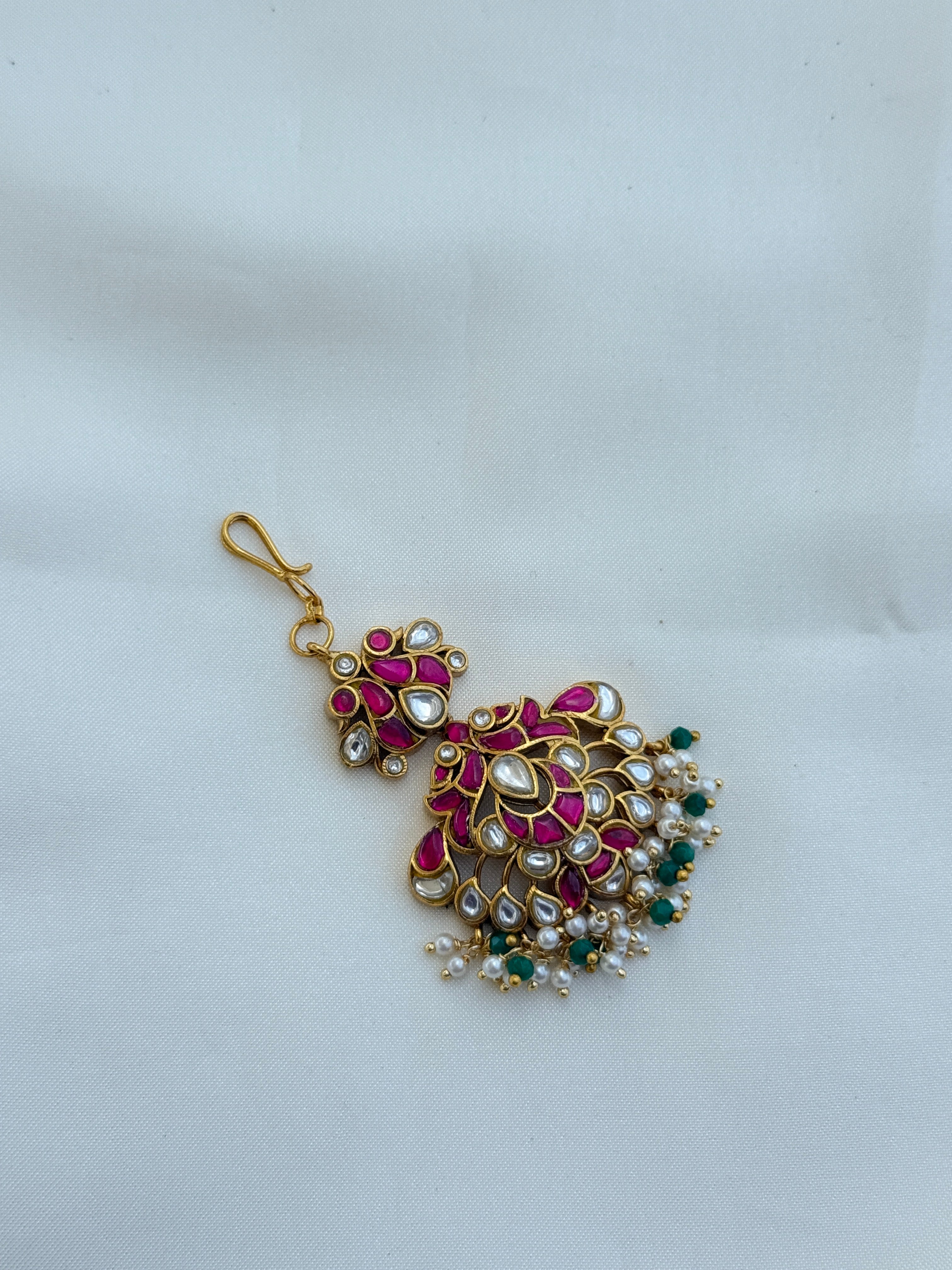 Tk554 jadau kundan peacock tikka