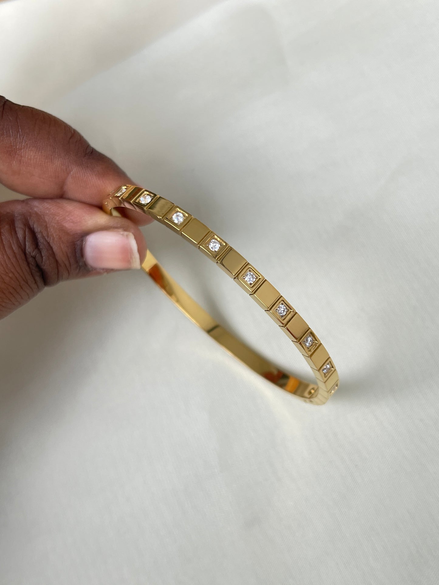 10 stone square gold bracelet