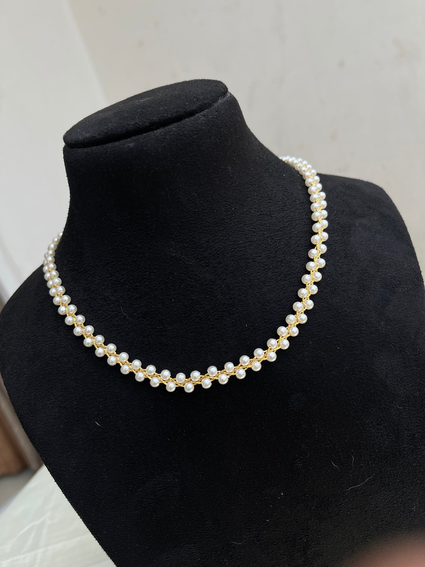 Budget friendly Short pearl neckline