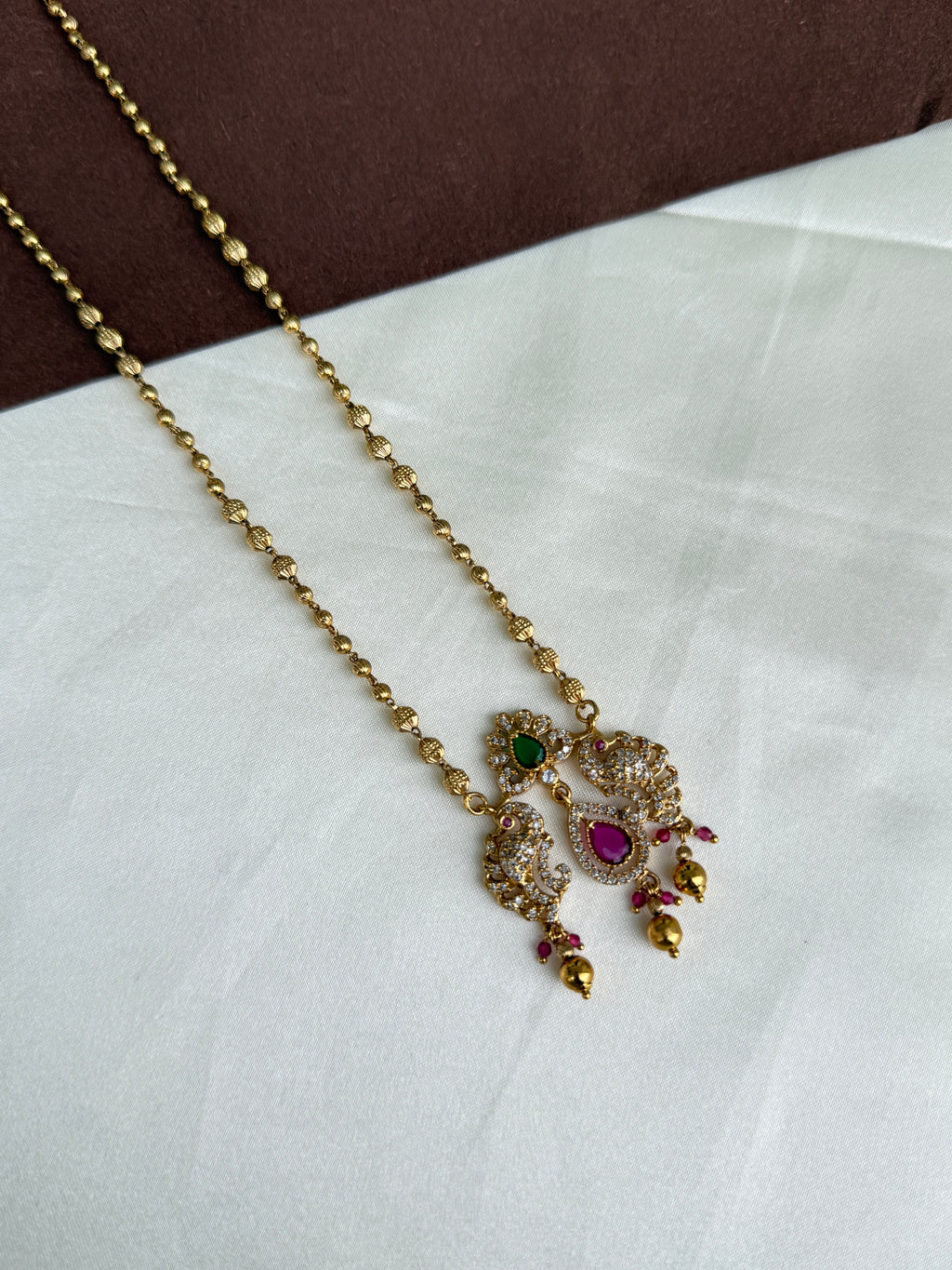 Dc026 gold balls chain with dual peacock pendant