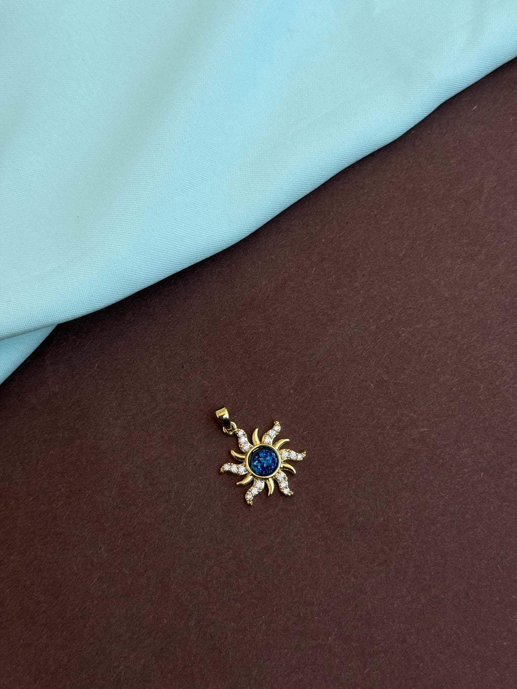Al014 anti tarnish blue sun charm ( pendent)