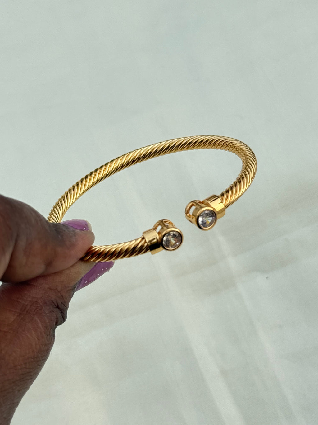 Ab008 white stone twist anti tarnish bracelet