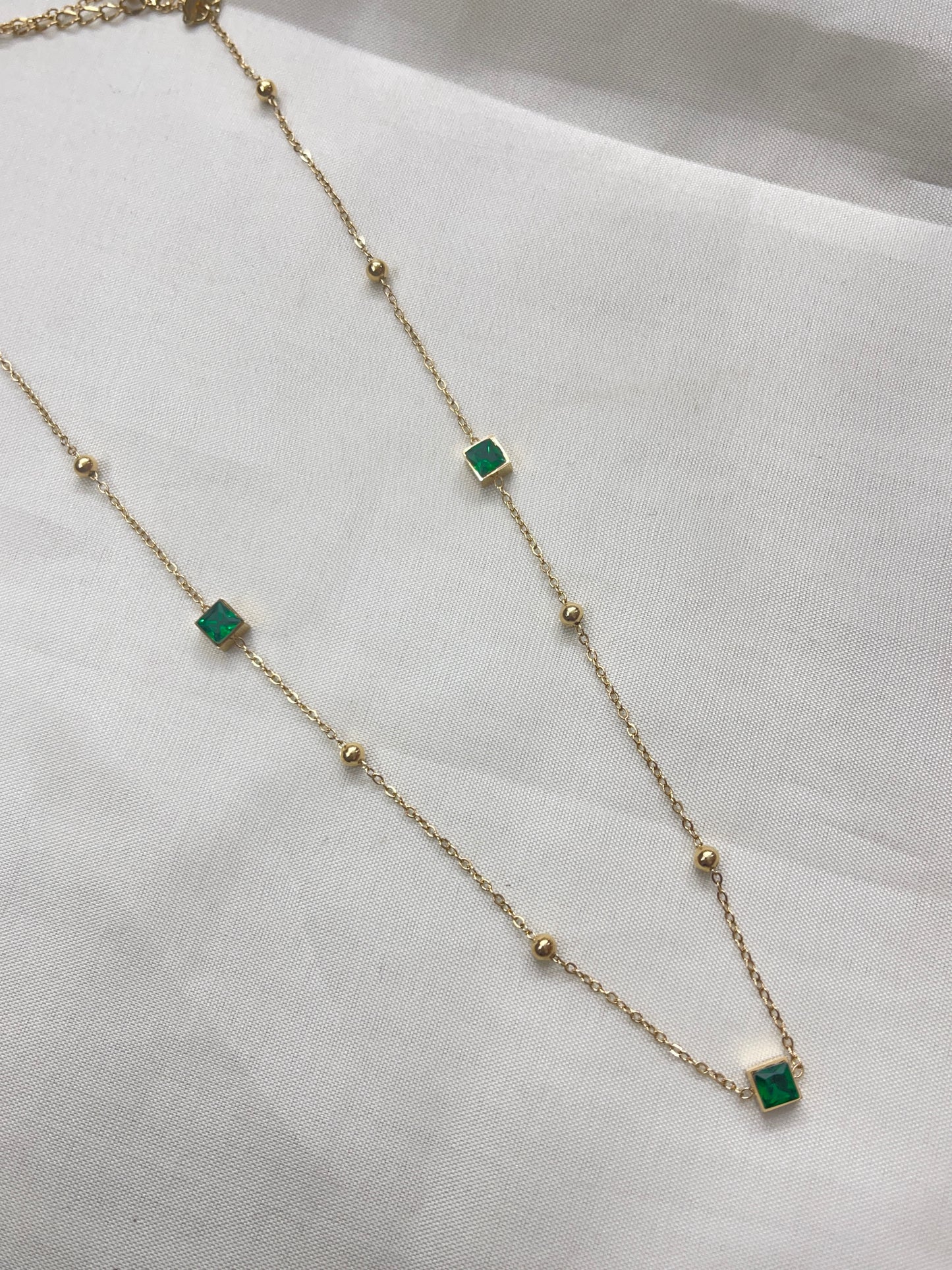 Green square stone neckline