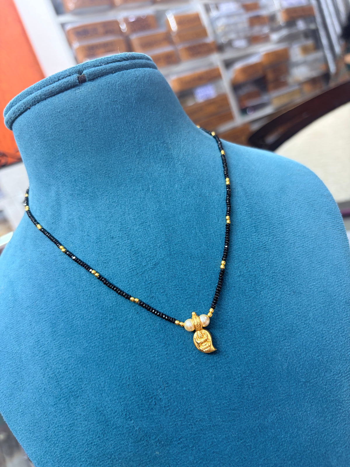 Crystal black bead with Panchaloham Lakshmi devi mango pendant 18 inches BB530