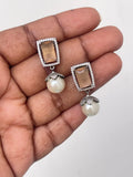 Studs pearl hanging