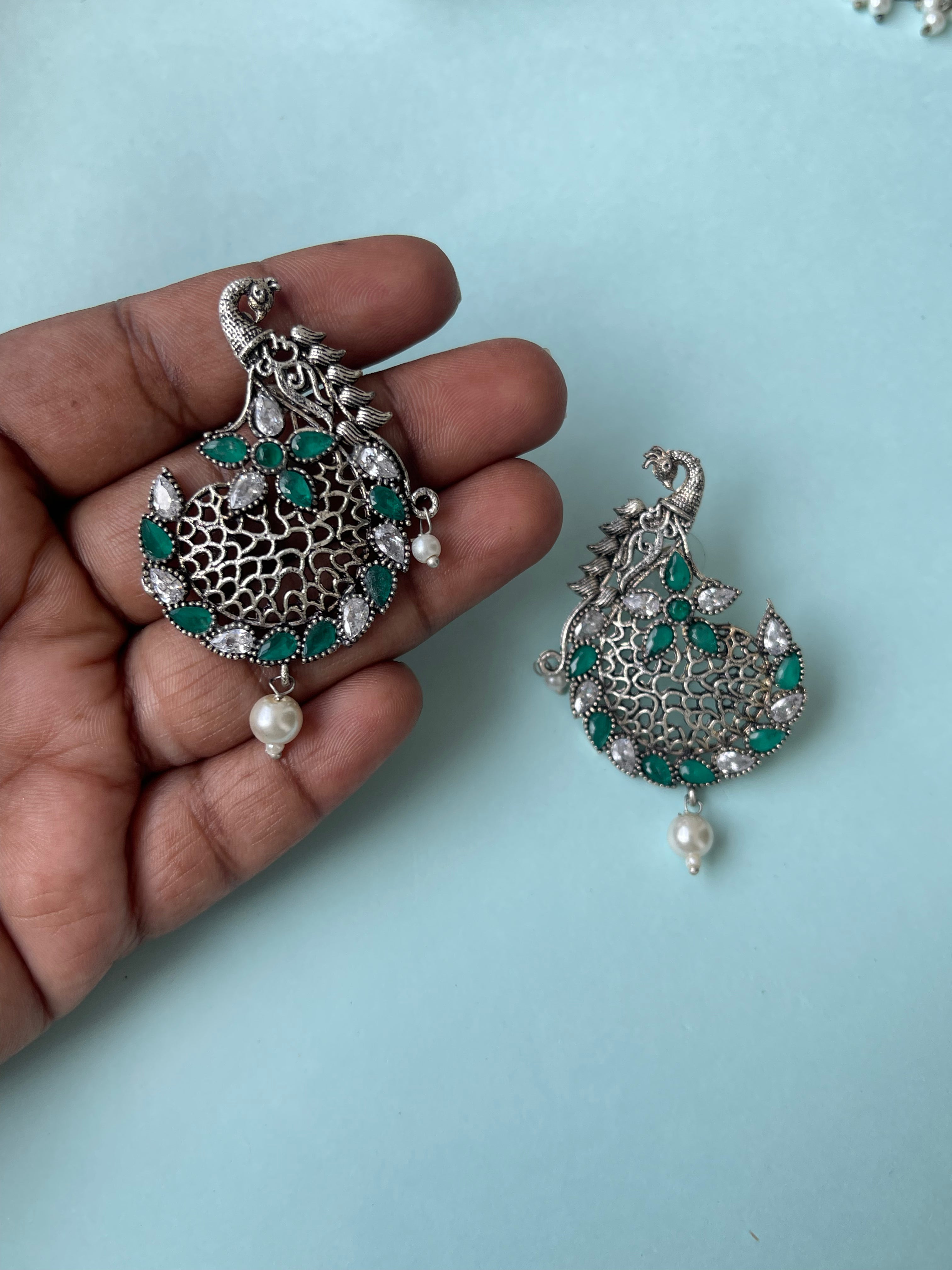Green white stone peacock Oxidised earrings