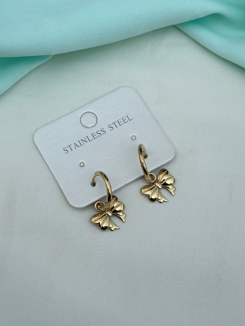 Er270 anti tarnish locksystem bow earrings