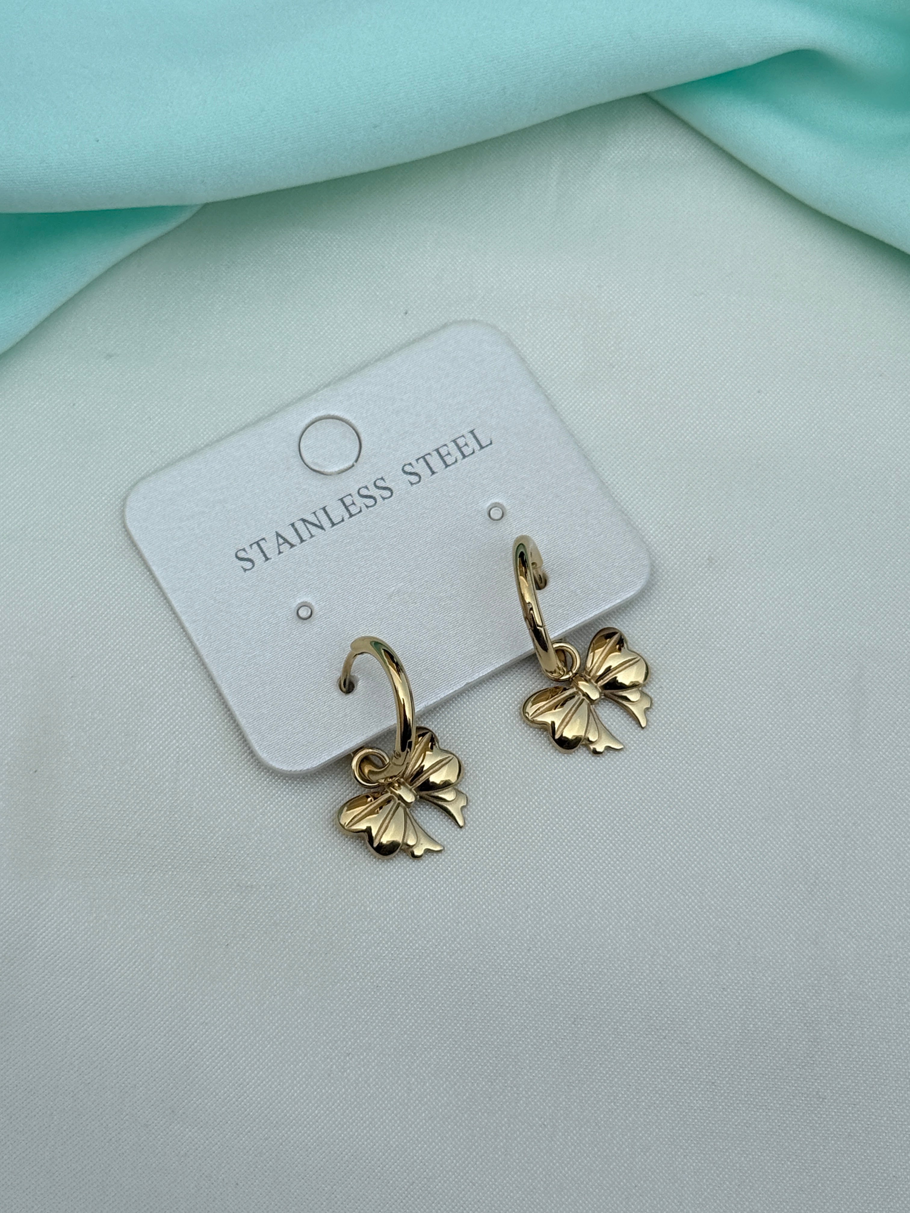 Er270 anti tarnish locksystem bow earrings