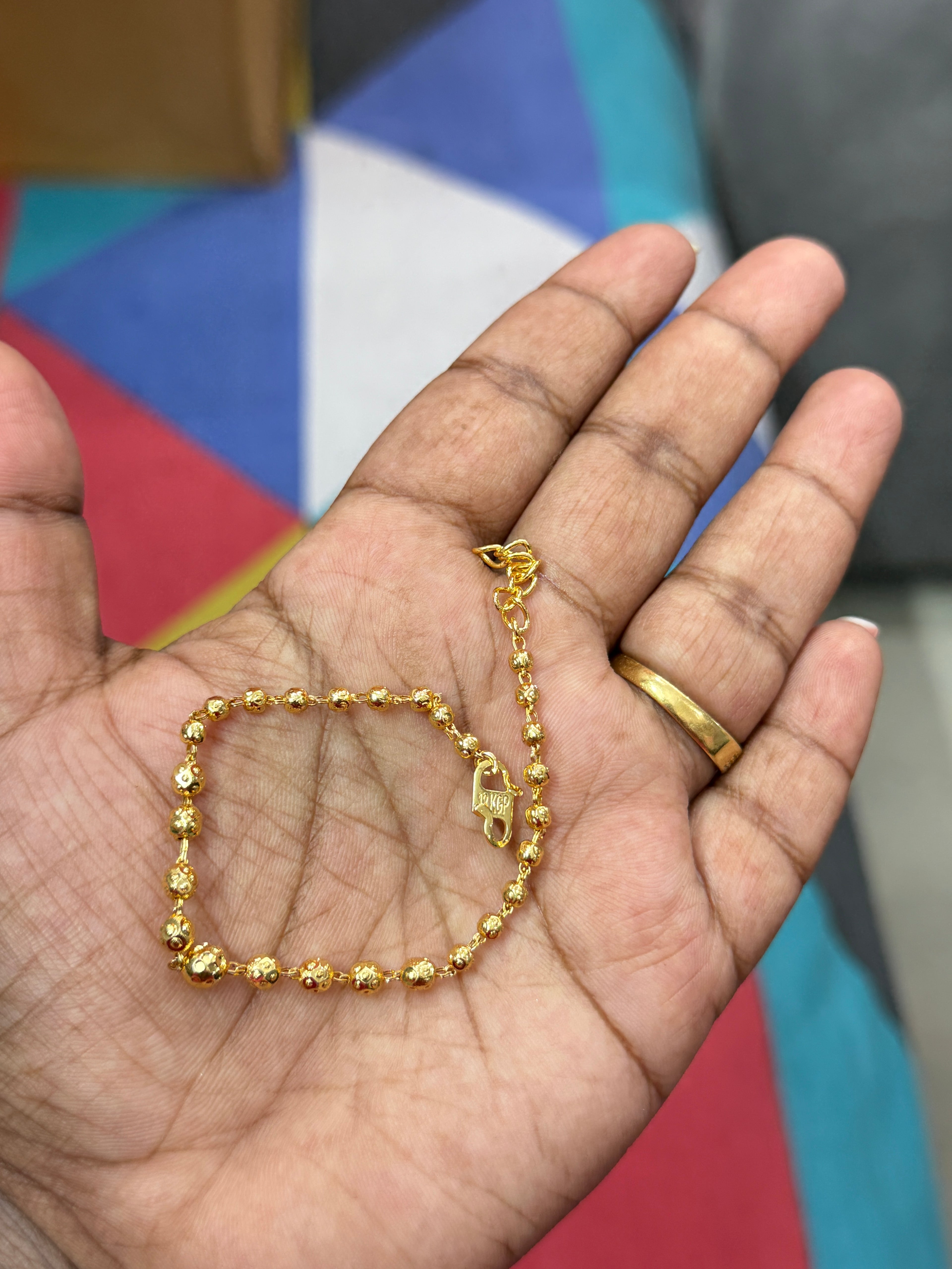 Br513 adjustable gold ball bracelet suits upto 2-6 size