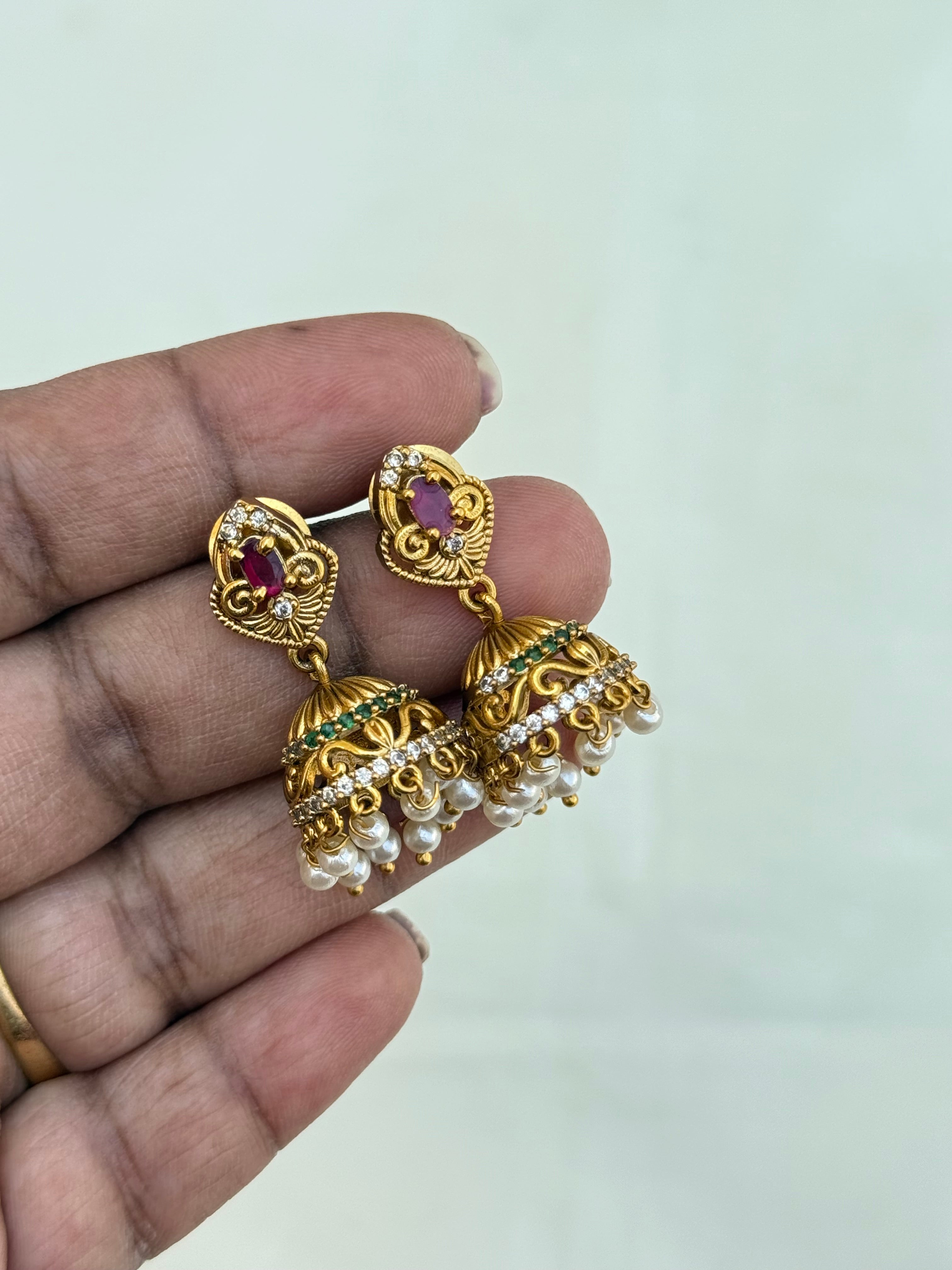 Er006 small butta cz earrings