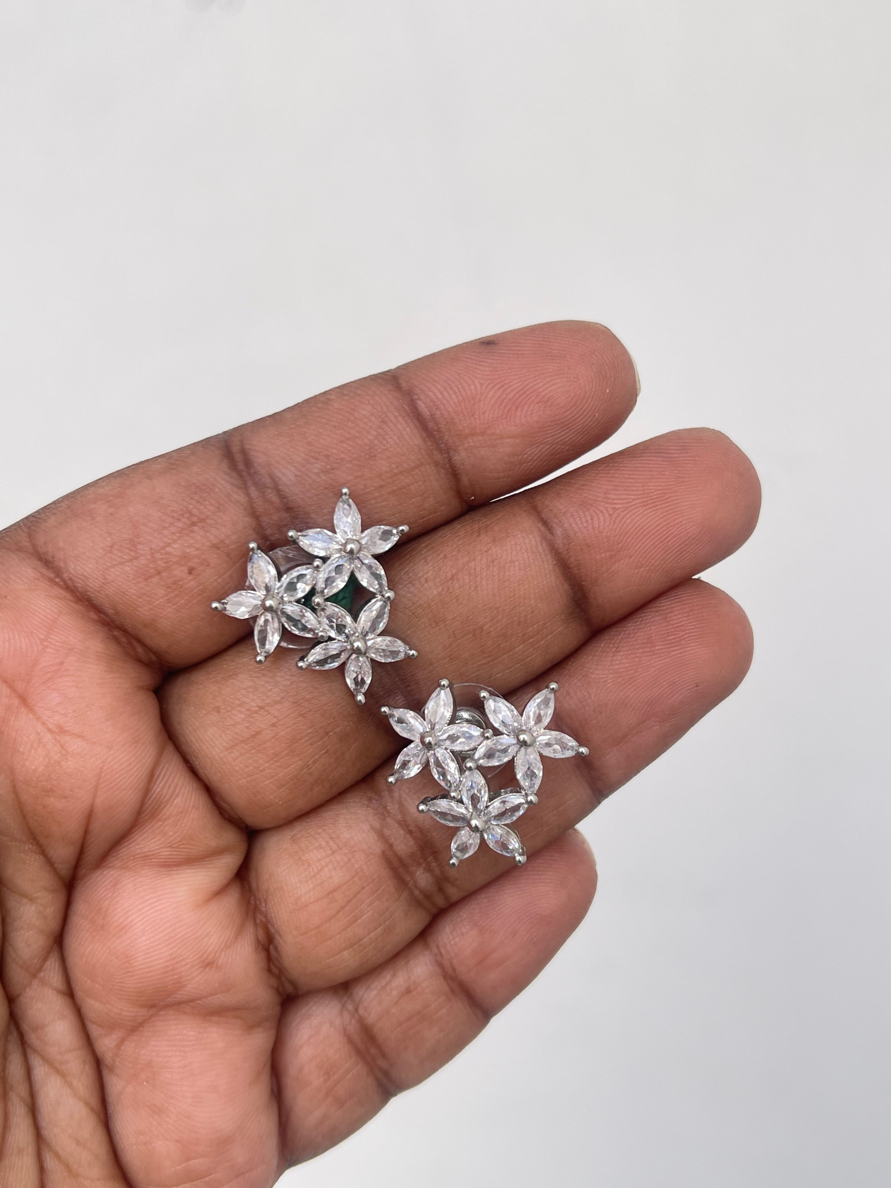 3 flowers white studs