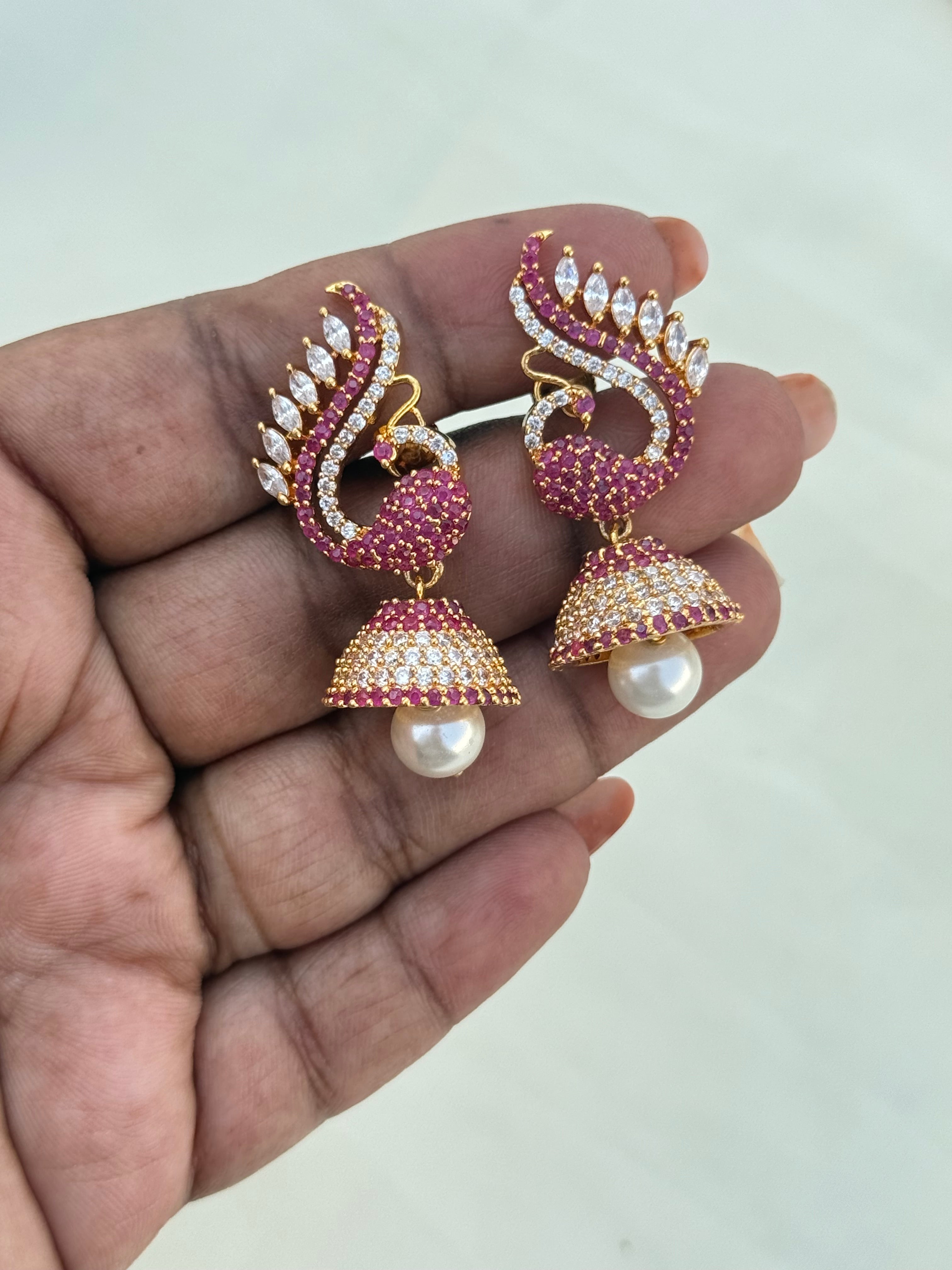 Er600 cz peacock butta Earrings