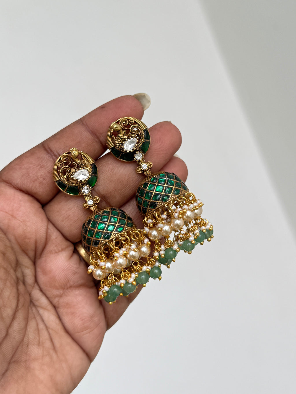 Er140 jadau kundan peacock butta earrings