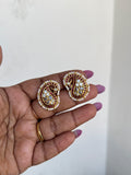 St037 pearl kemp mango peacock studs