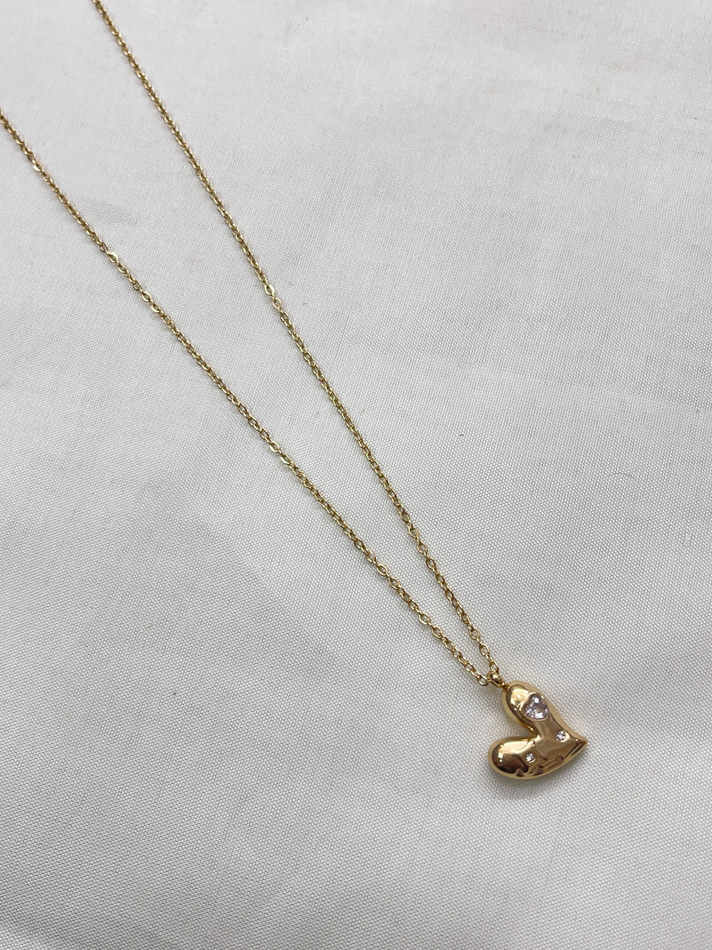 Hear pendant neckline