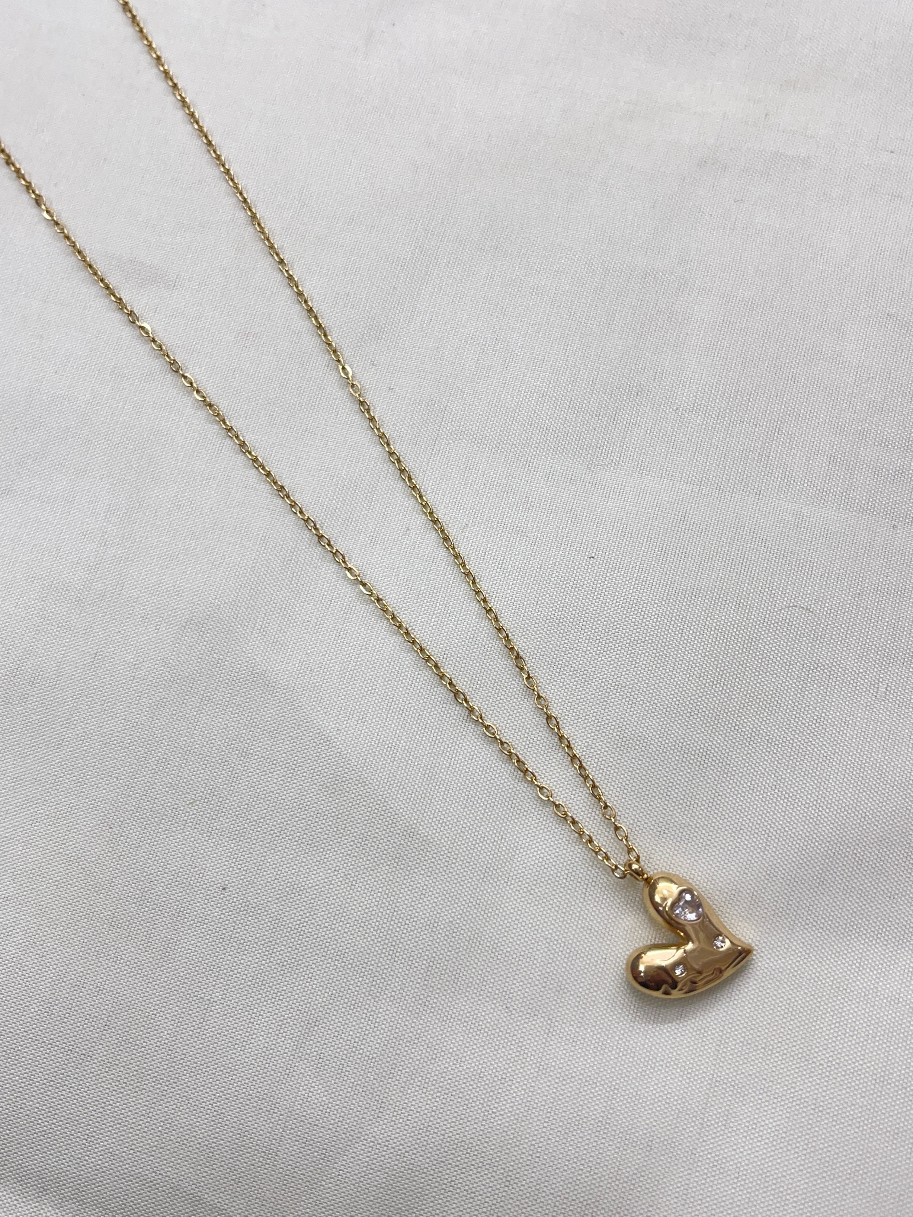 Hear pendant neckline