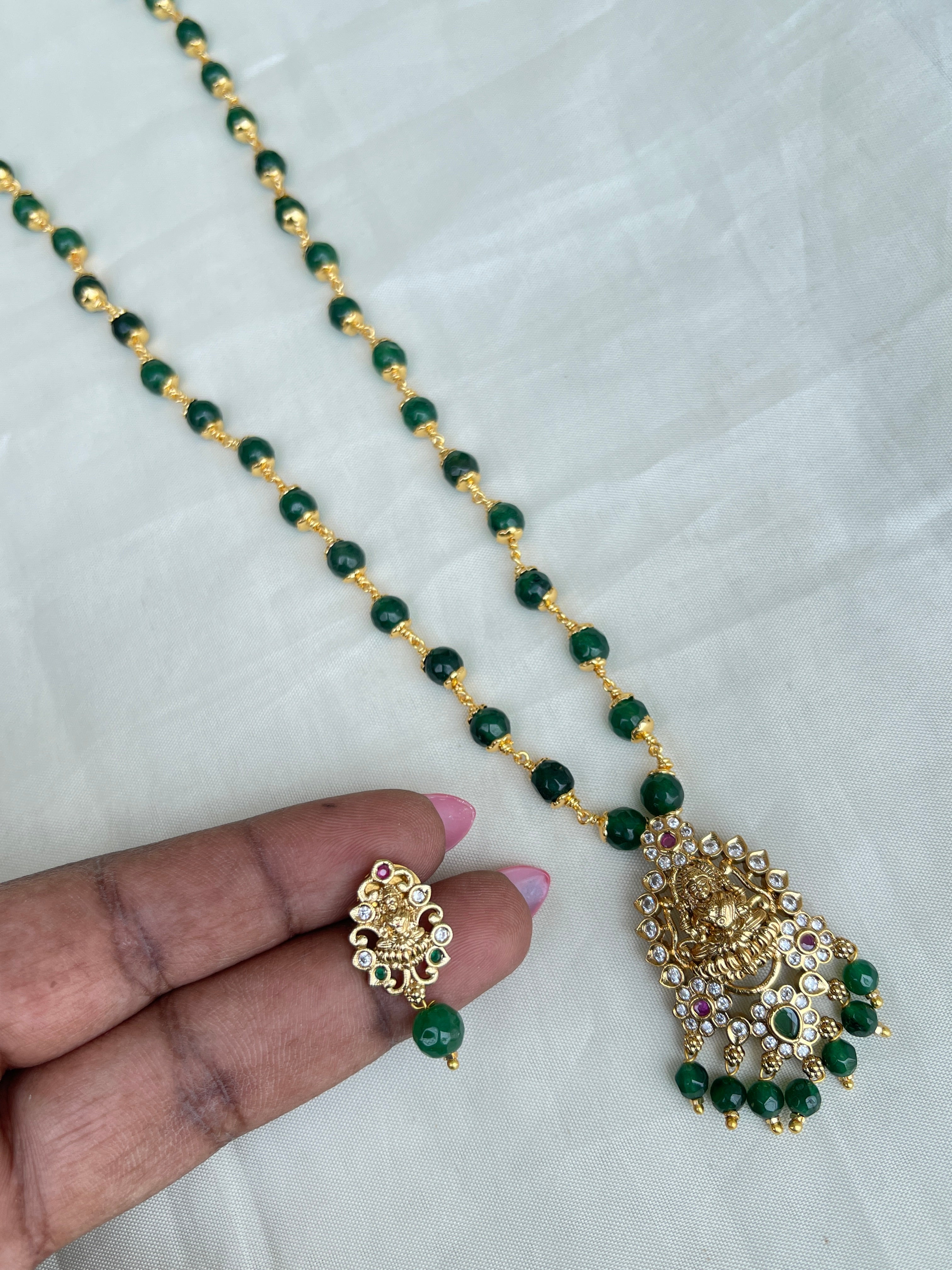 Green ruby Circle beads with kattu theega along with Lakshmi Devi pendant