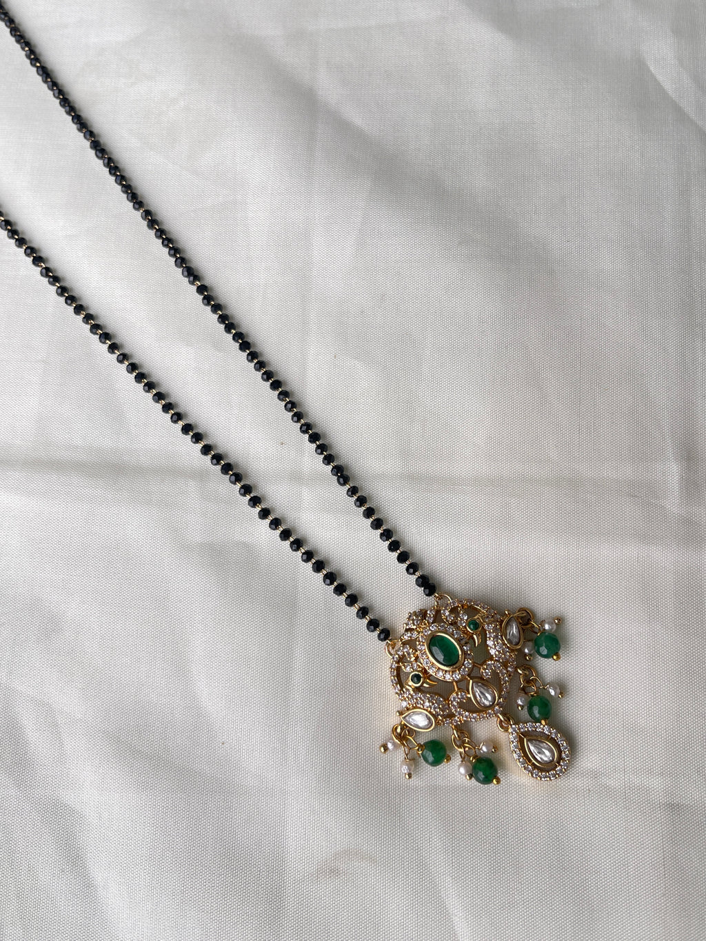 Dual peacock moissanite single line blackbeads