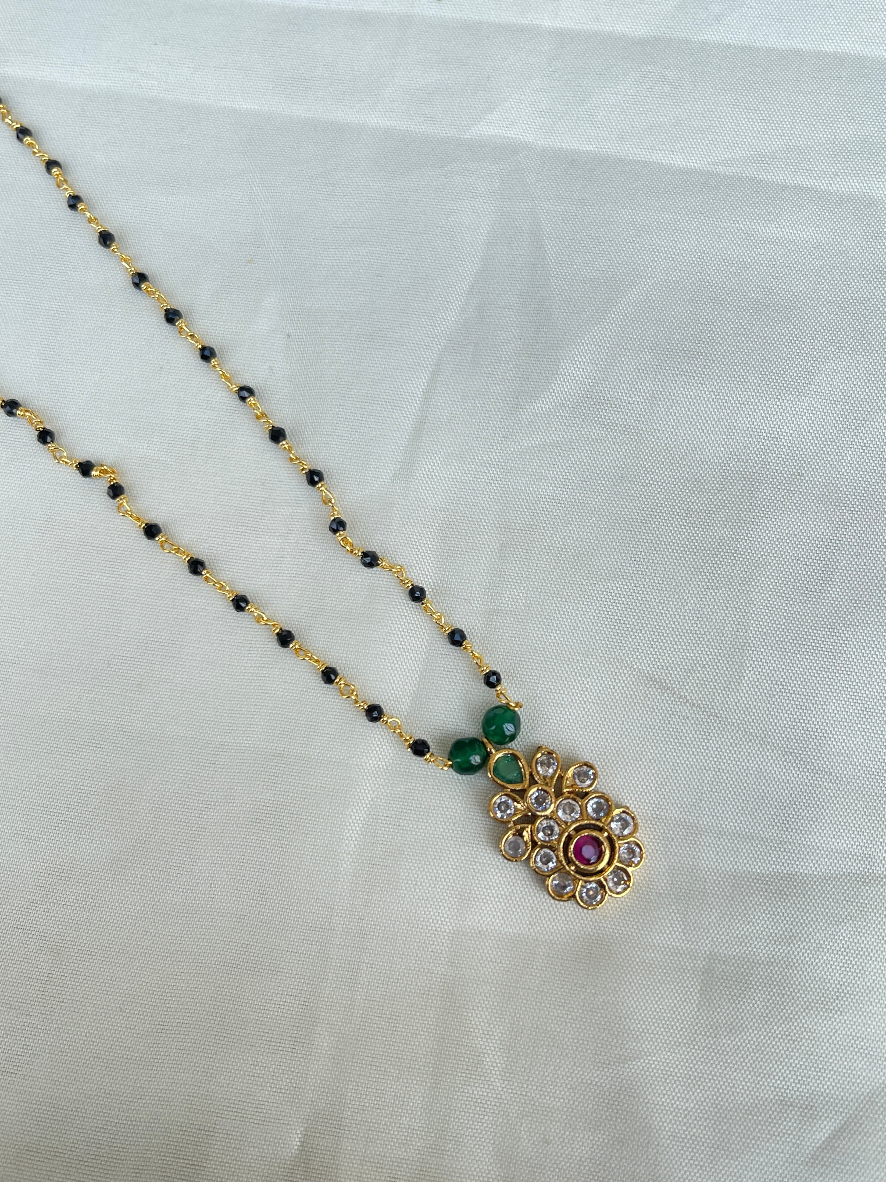 Single line short blackbeads with small pendant bb1631