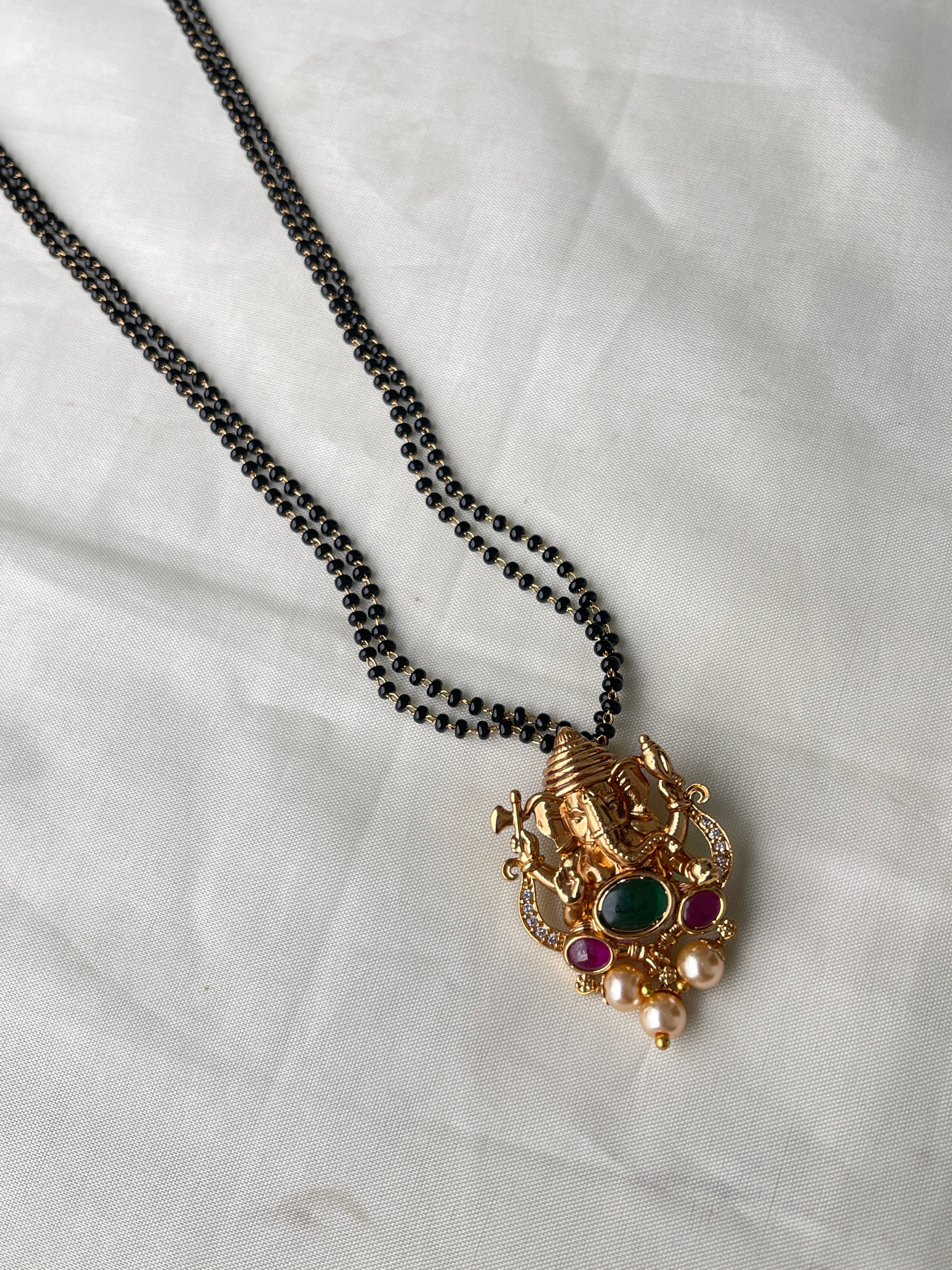 2 lines short blackbeads with lord ganesha pendante