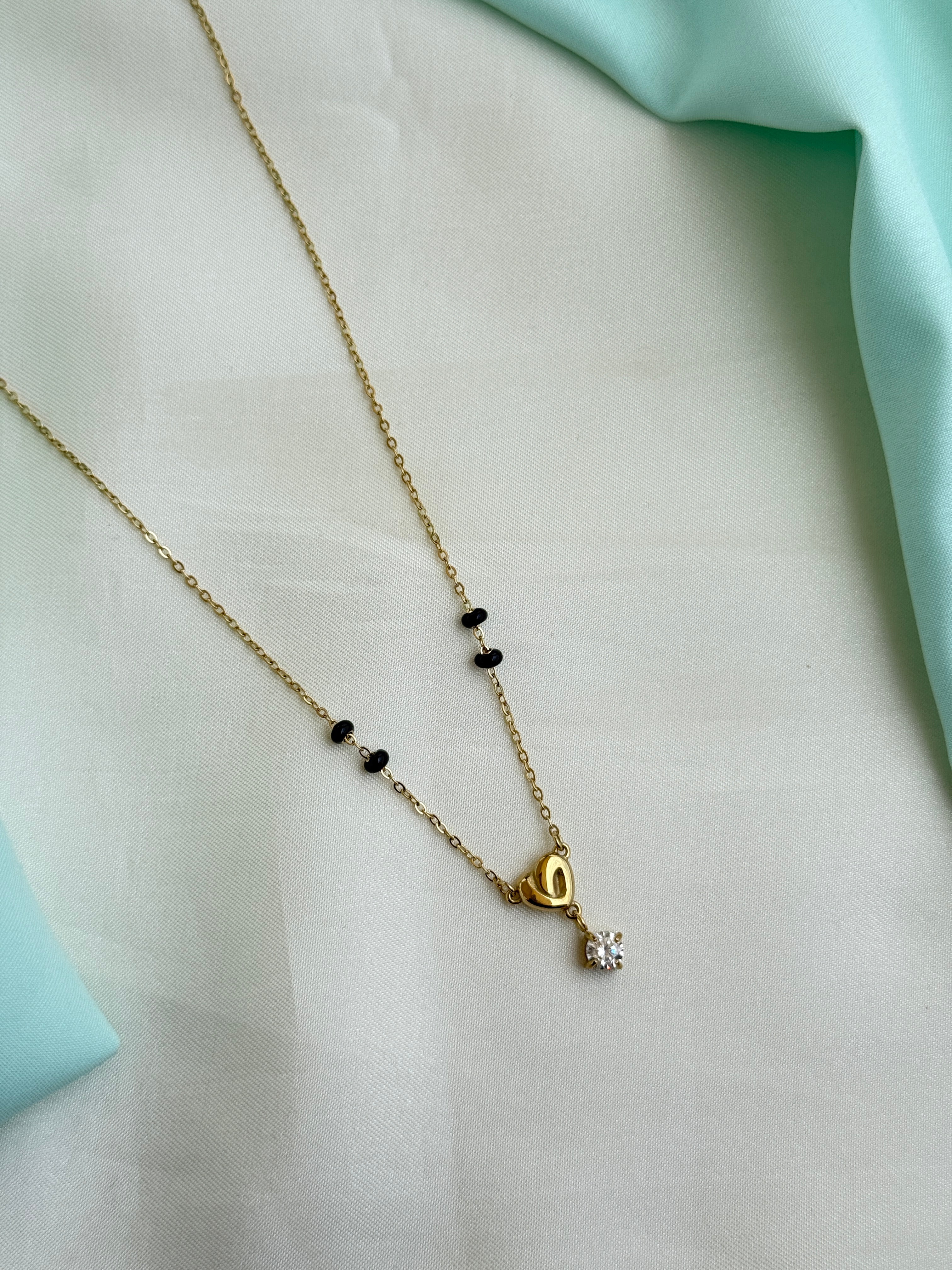 Bb130 anti tarnish gold heart stone 16 to 18 inches adjustable black beads
