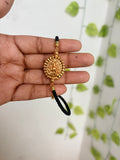 Lakshmidevi design black thread adjustable rakhi bracelet br581