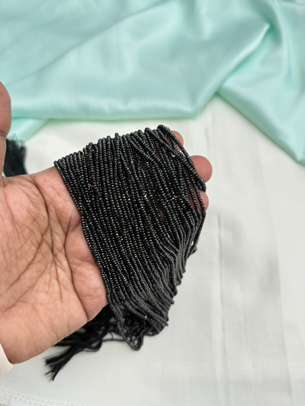 BB151 Crystal black beads each line 250rupees