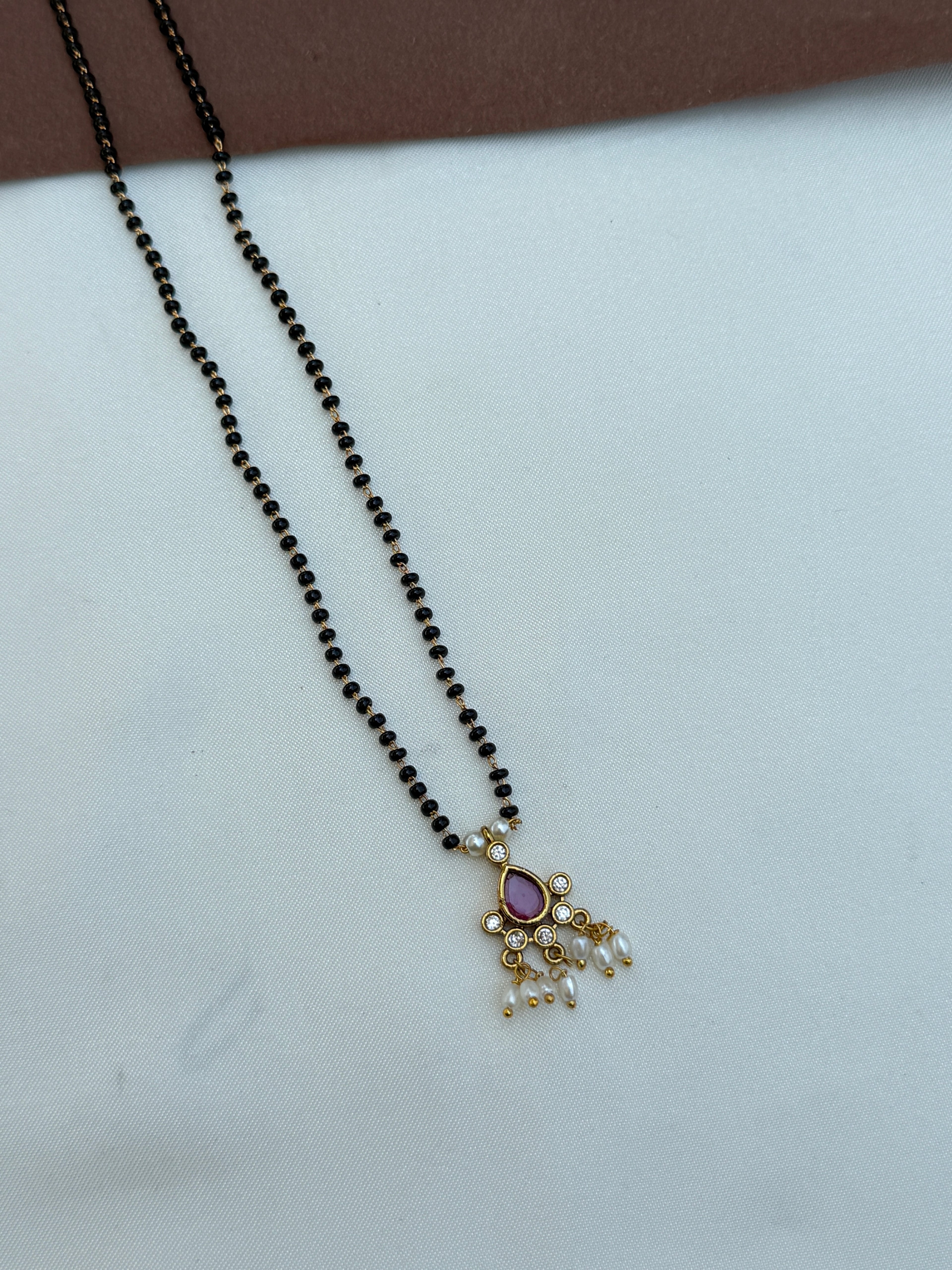 Bb106 18 inches single line kemp blackbeads with rice pearls