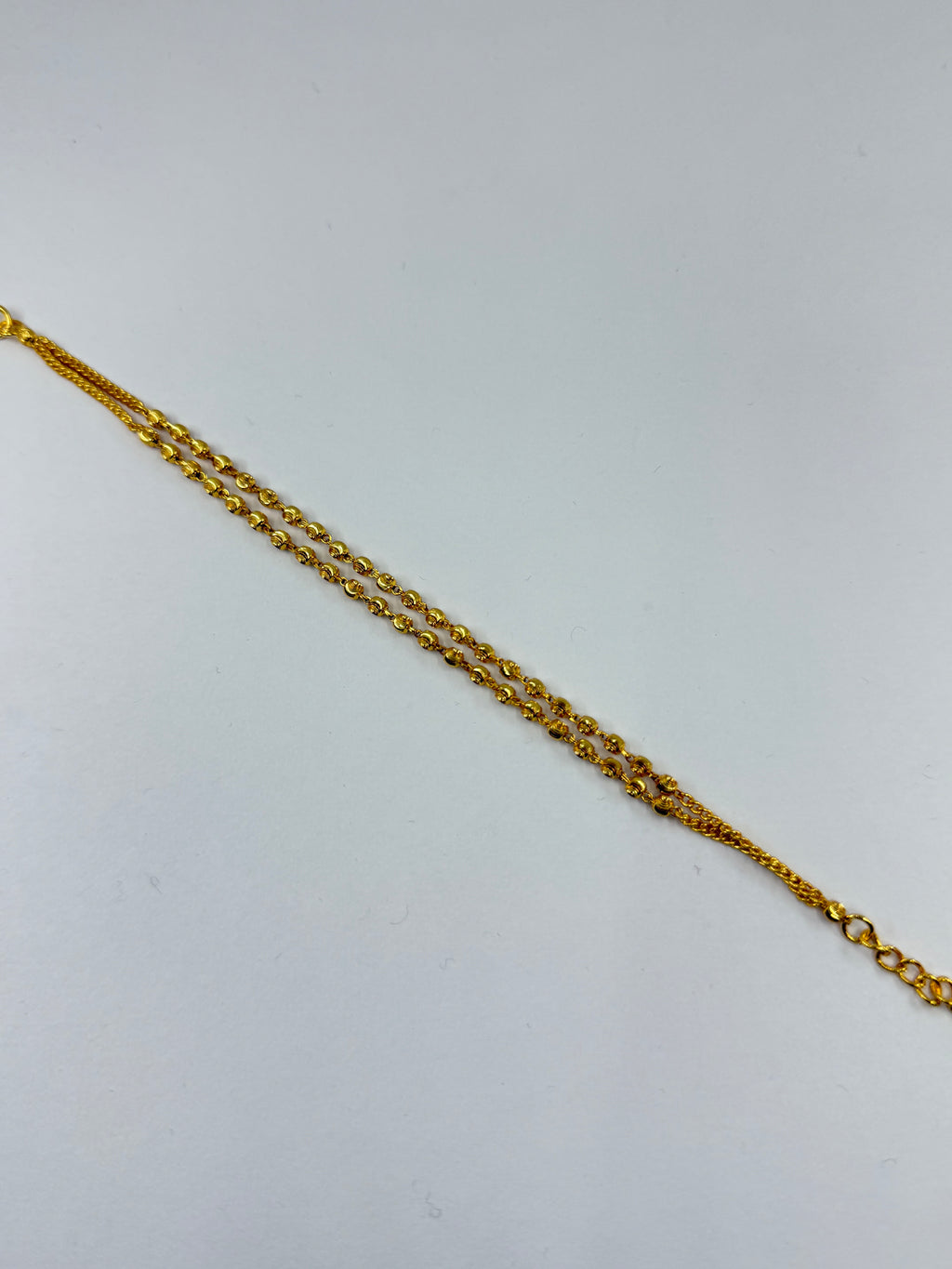 Br515 2 lines gold ball bracelet