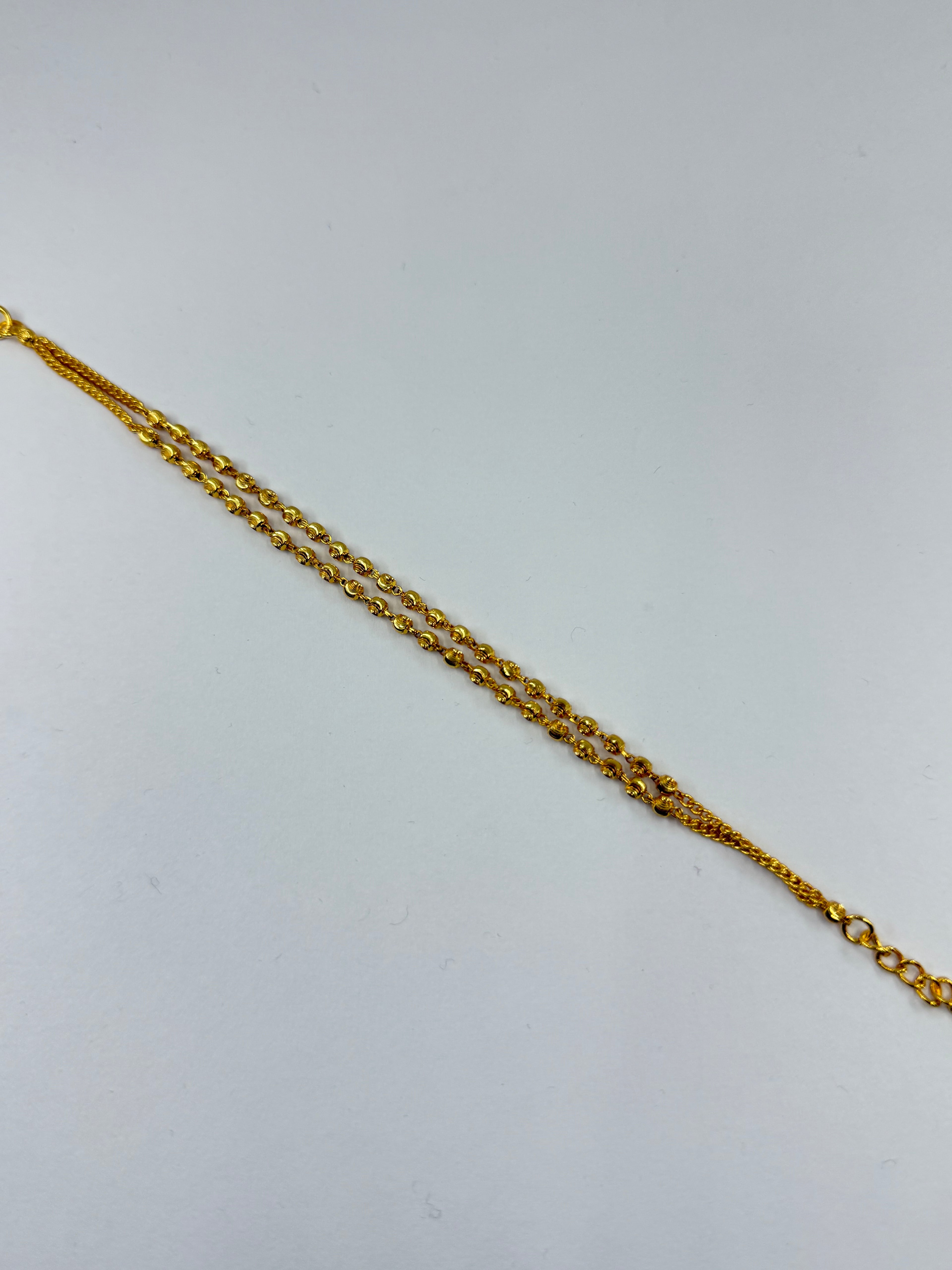 Br515 2 lines gold ball bracelet