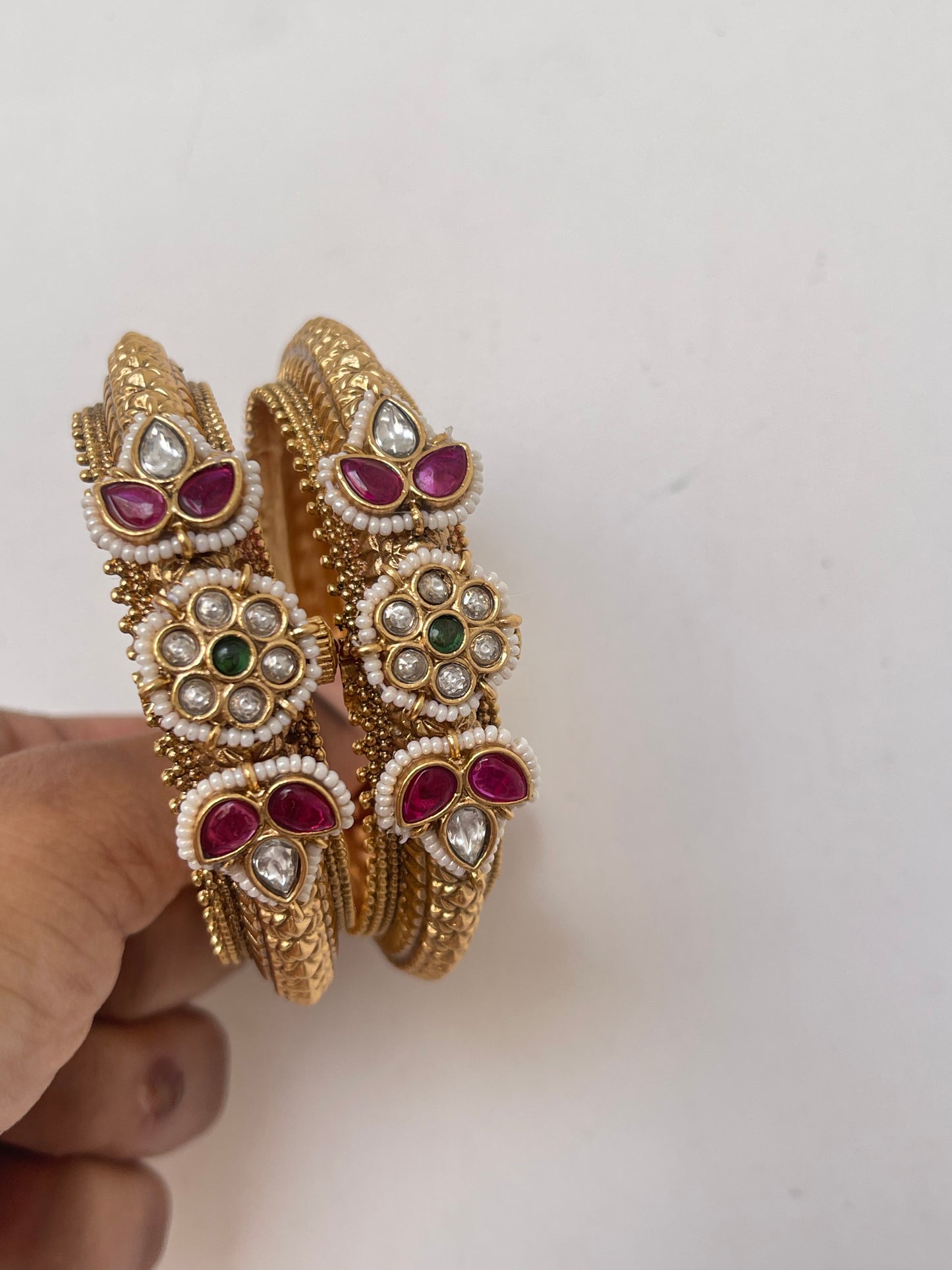 Pair of jadau kundan stone openable bangle