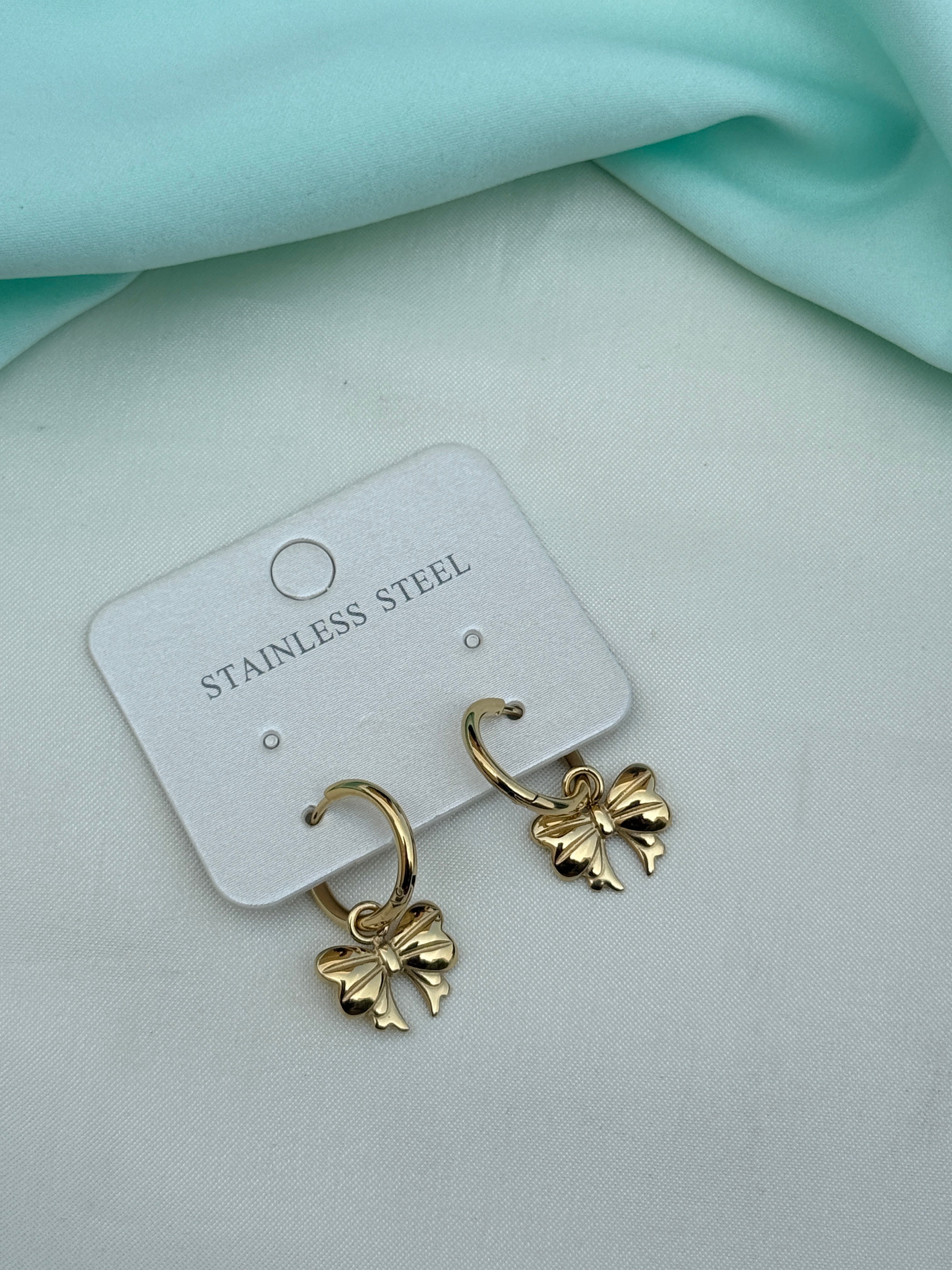 Er270 anti tarnish locksystem bow earrings