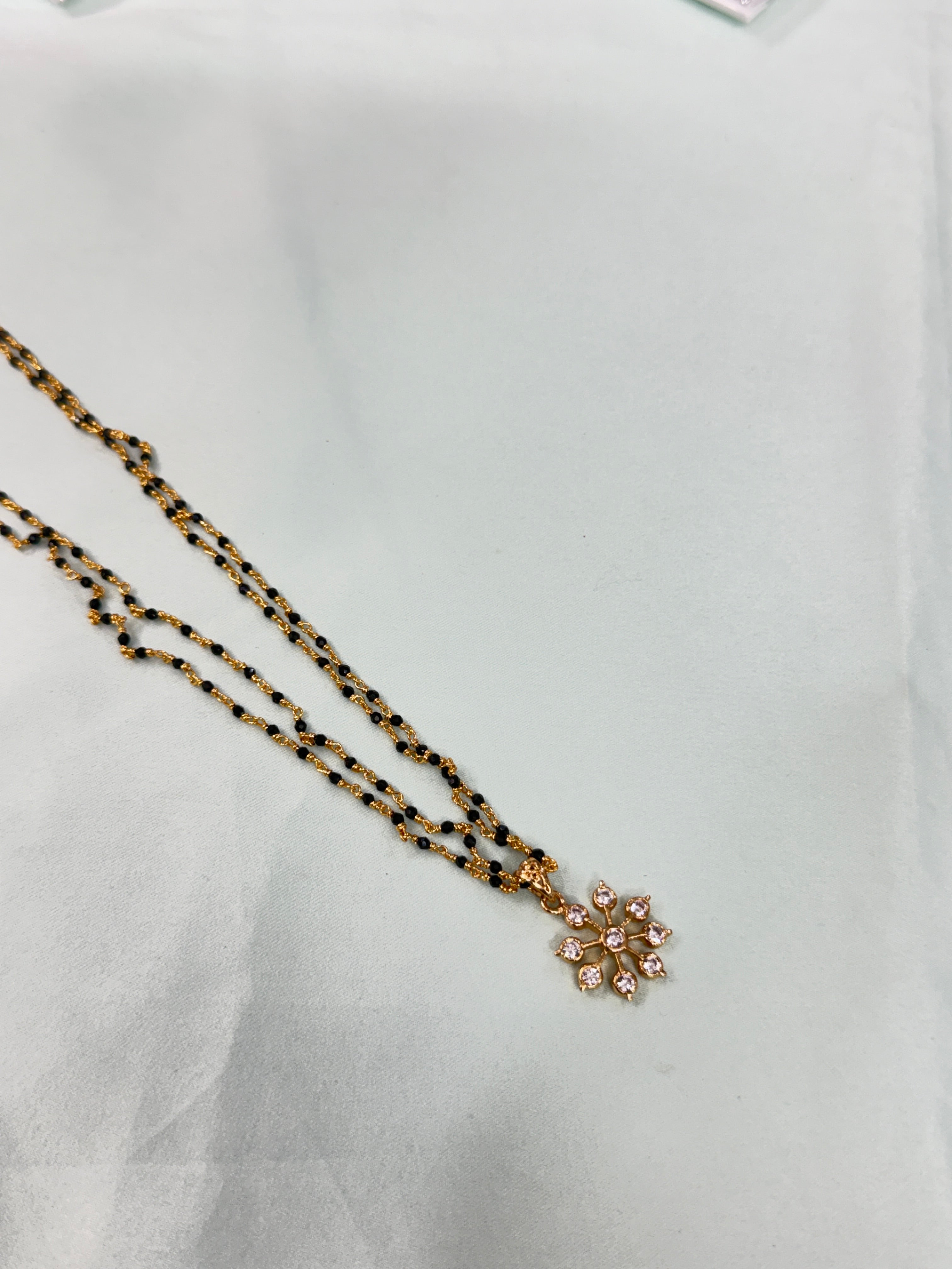Bb220 micro gold 2 layers black bead with Panchaloham pendant 18 inches black beads