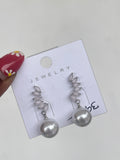 Silver pearl earrings Color won't fade