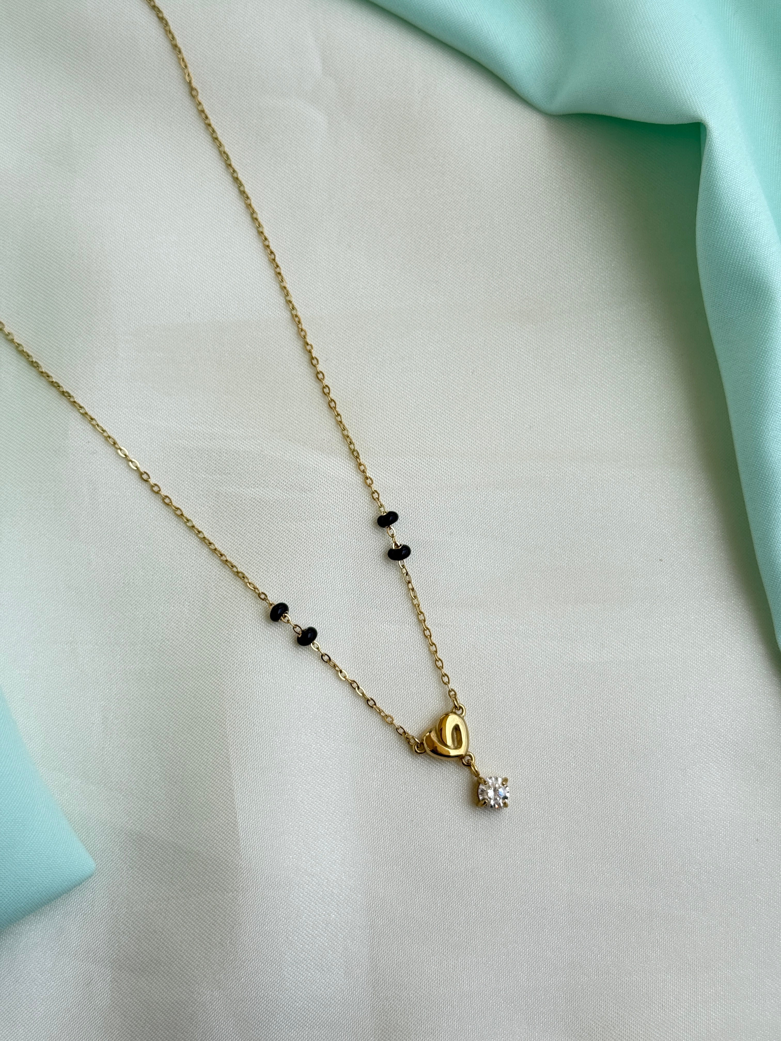 Bb130 anti tarnish gold heart stone 16 to 18 inches adjustable black beads