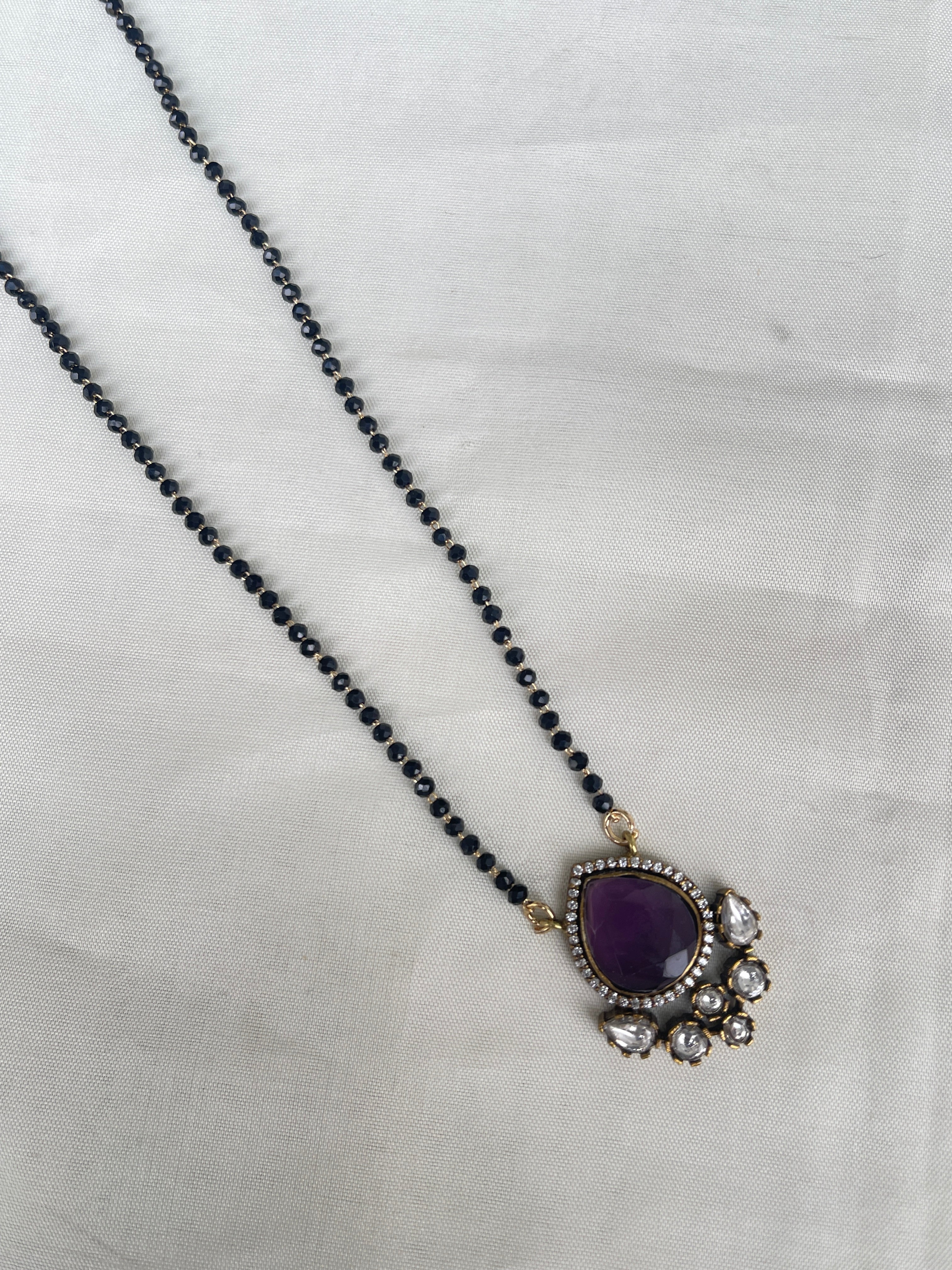 Single line blackbeads with purple pendant bb1716