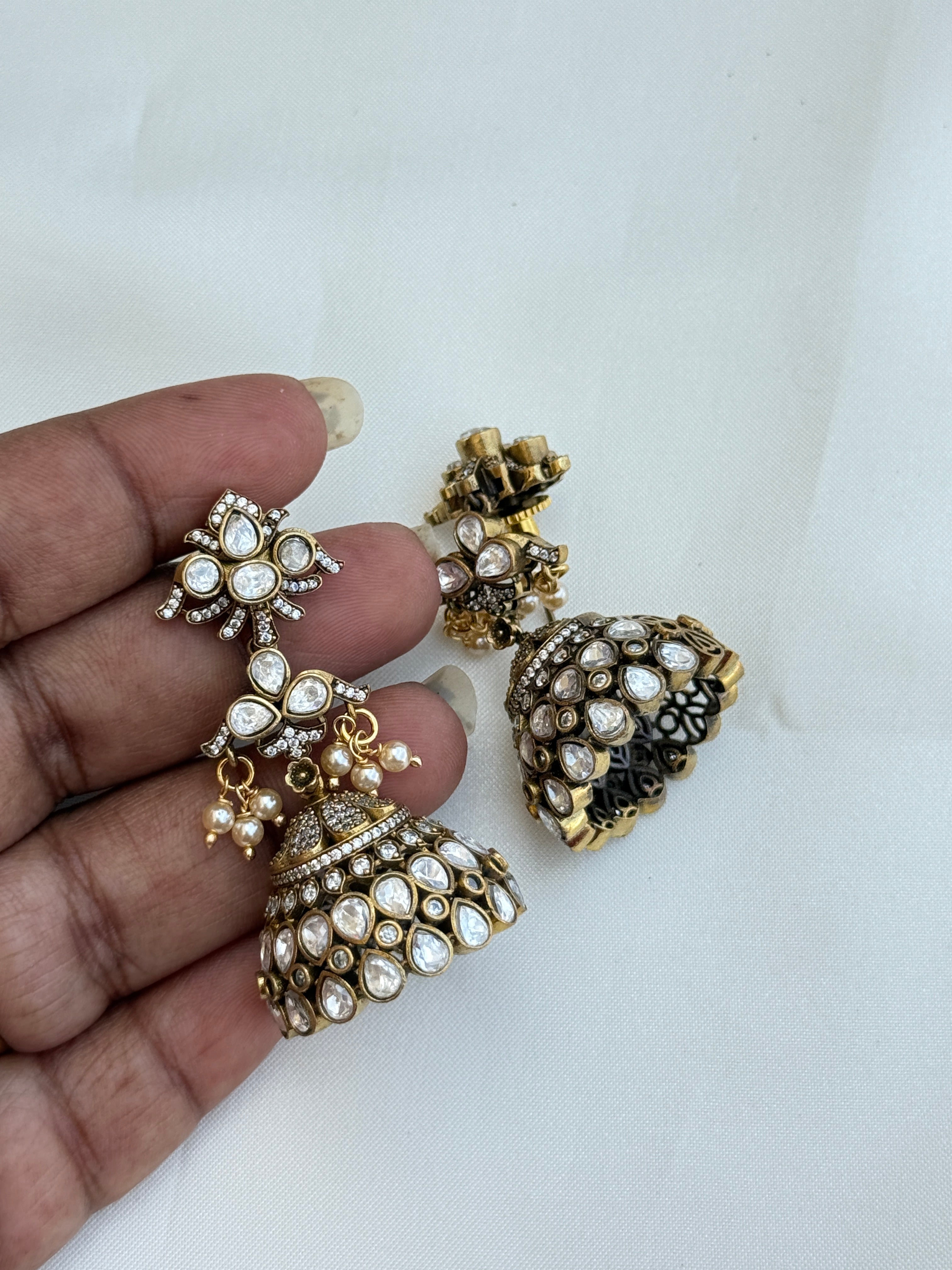 Er144 moissanate butta earrings
