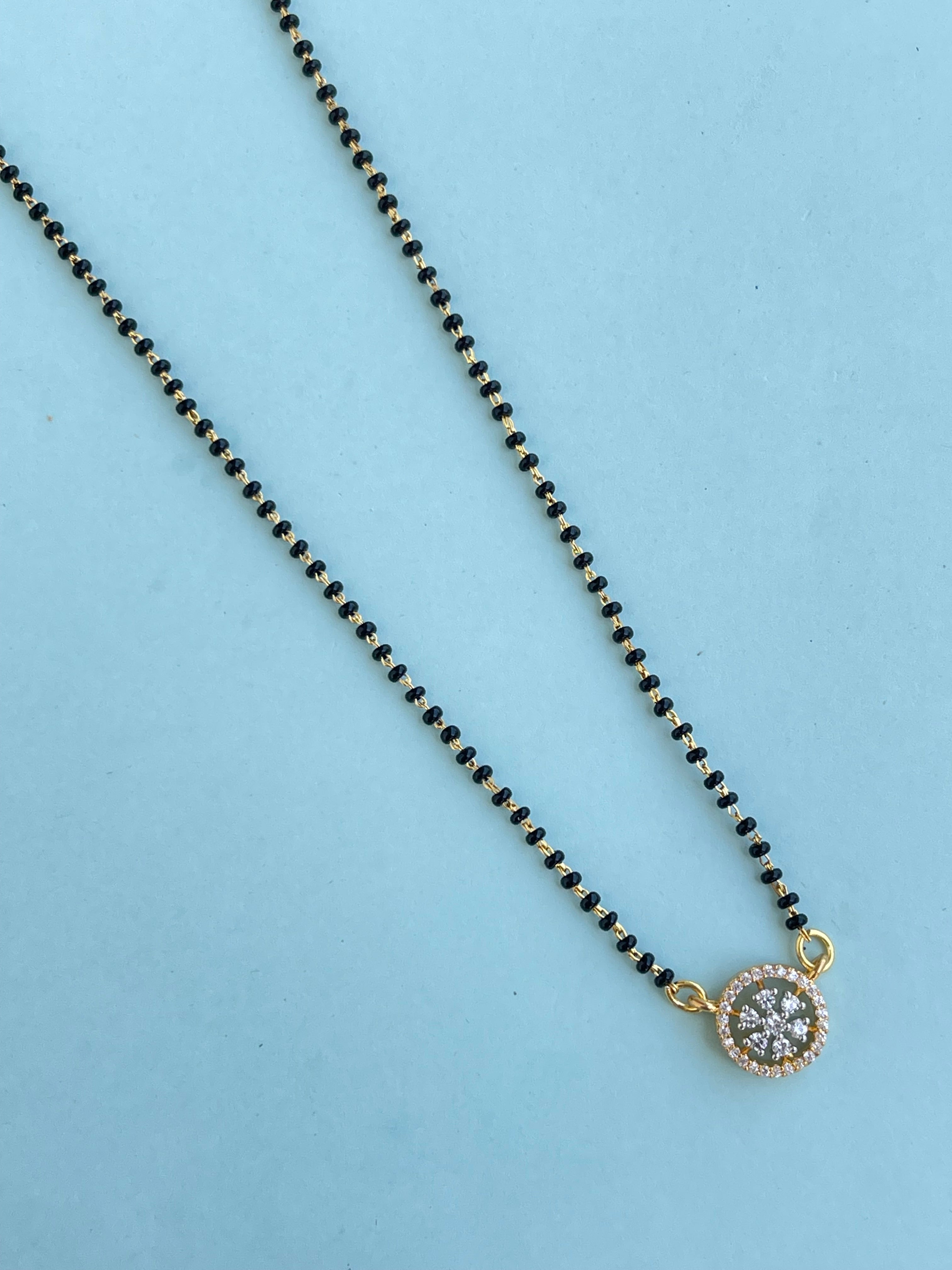 Single line blackbeads with diamond pendant and earrings (mangalsutra)