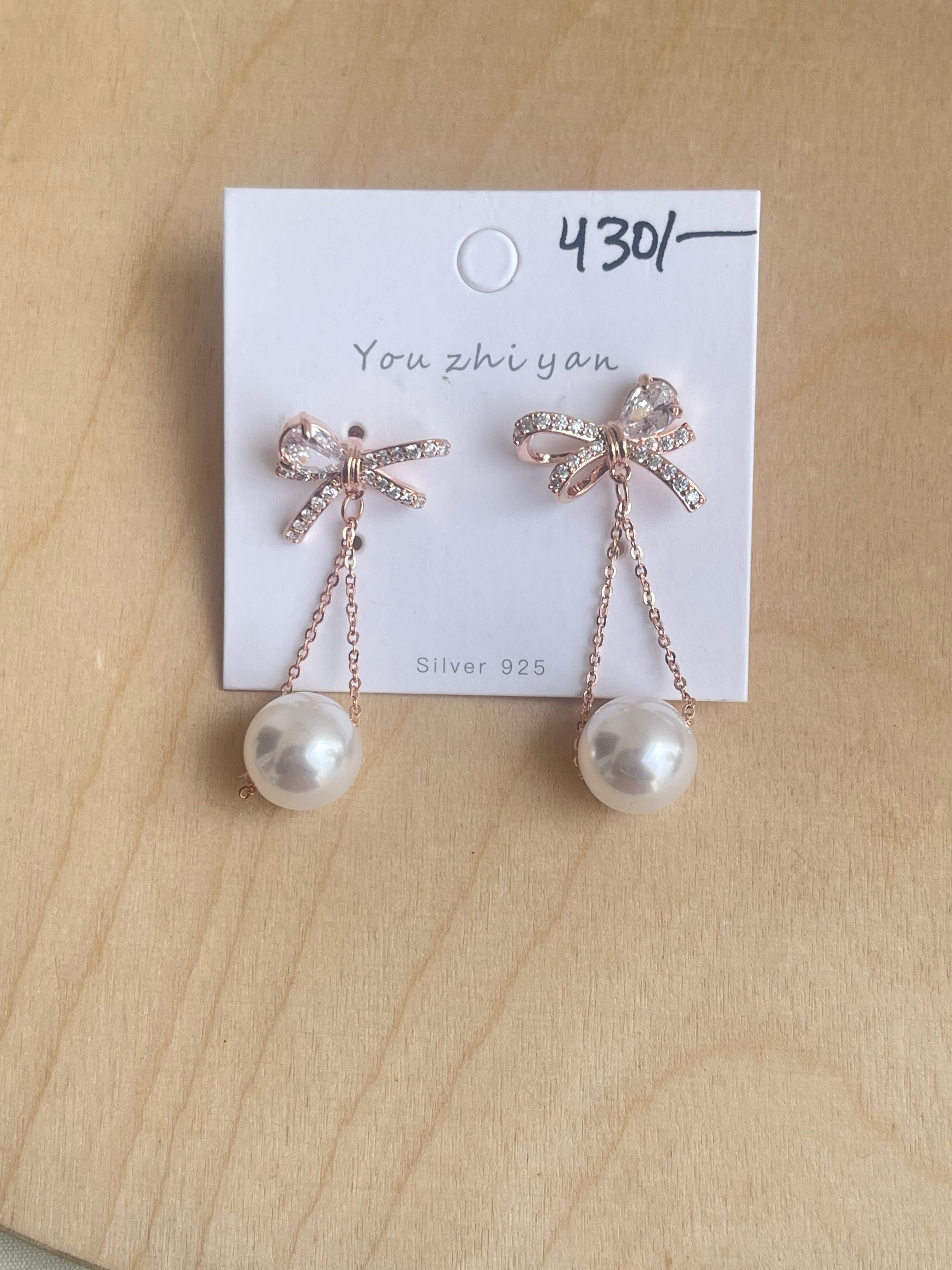 Bow pearl hanging tassels