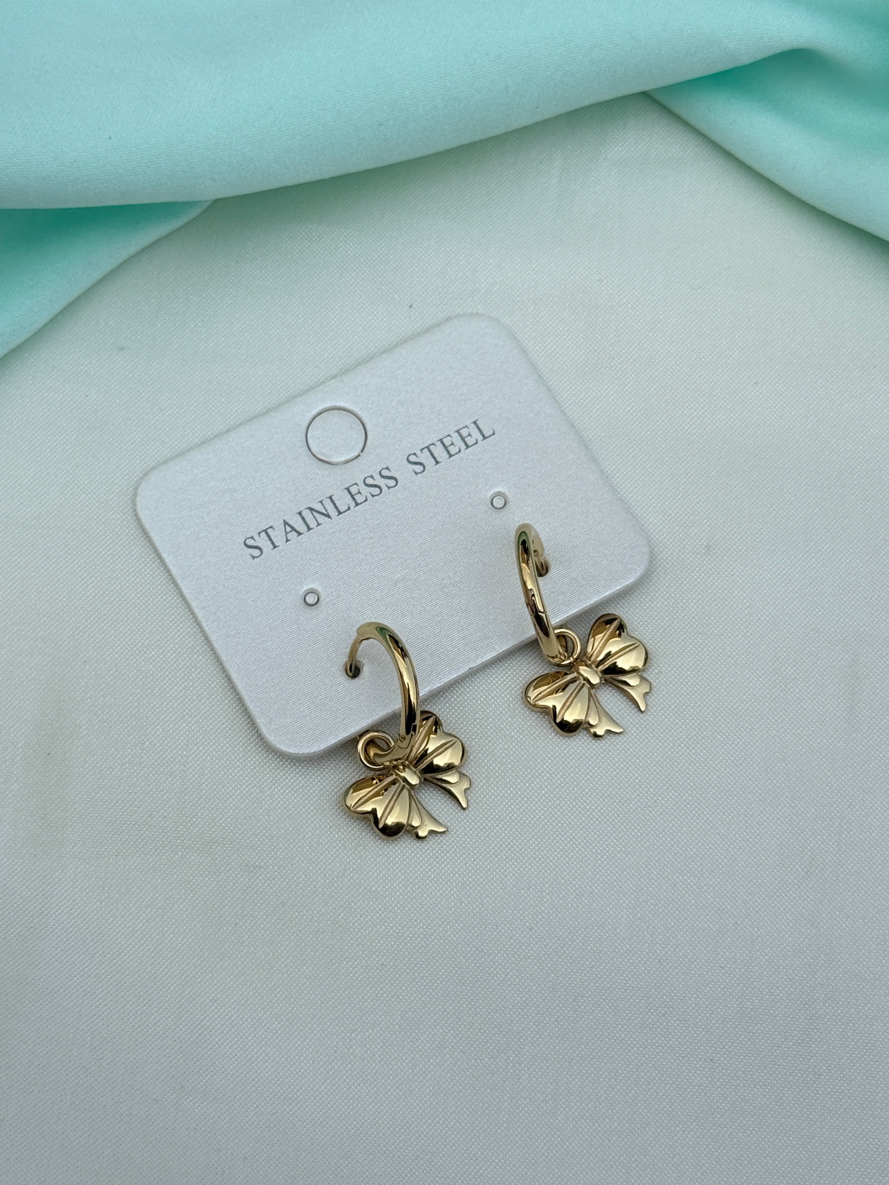 Er270 anti tarnish locksystem bow earrings