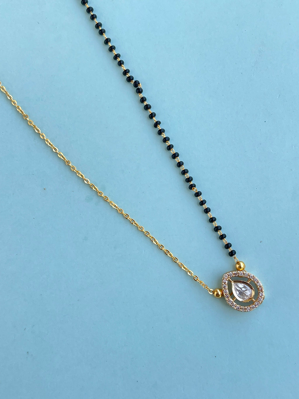 Simple Kundan pendent with Earrings blackbeads (mangalsutra)