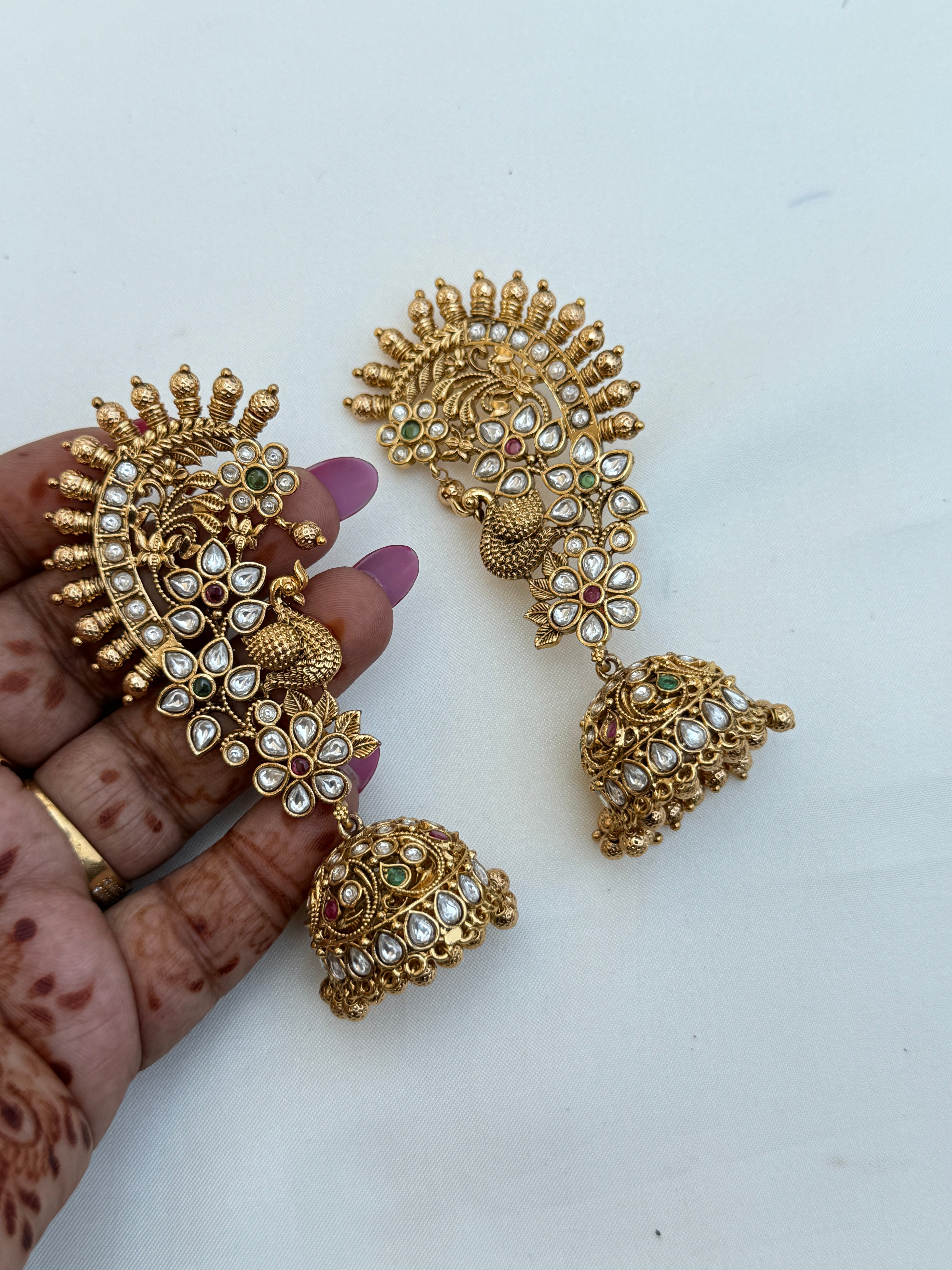 Er220 peacock Kundan butta big earcuffs
