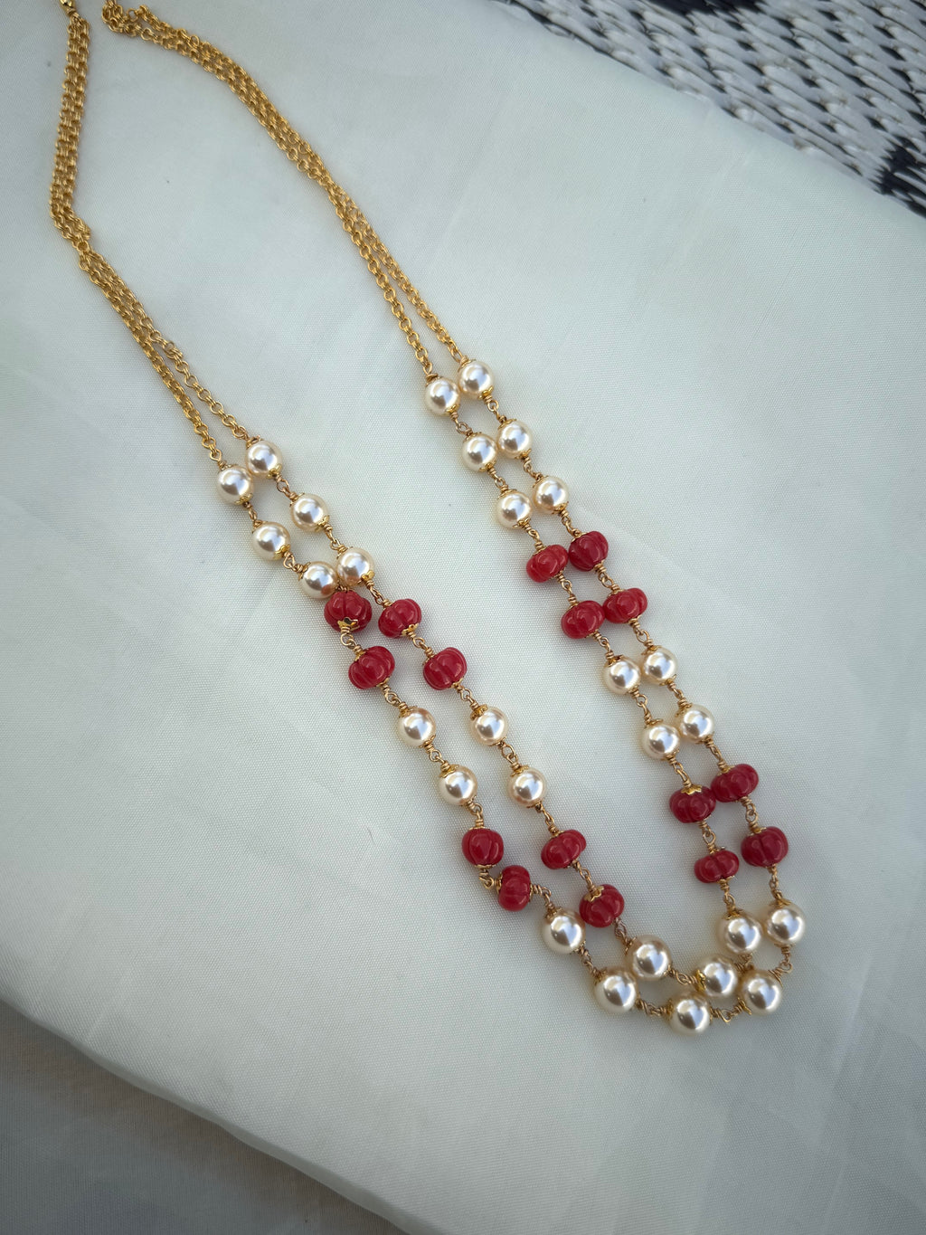 Bb229 2 lines pumpkin coral beads