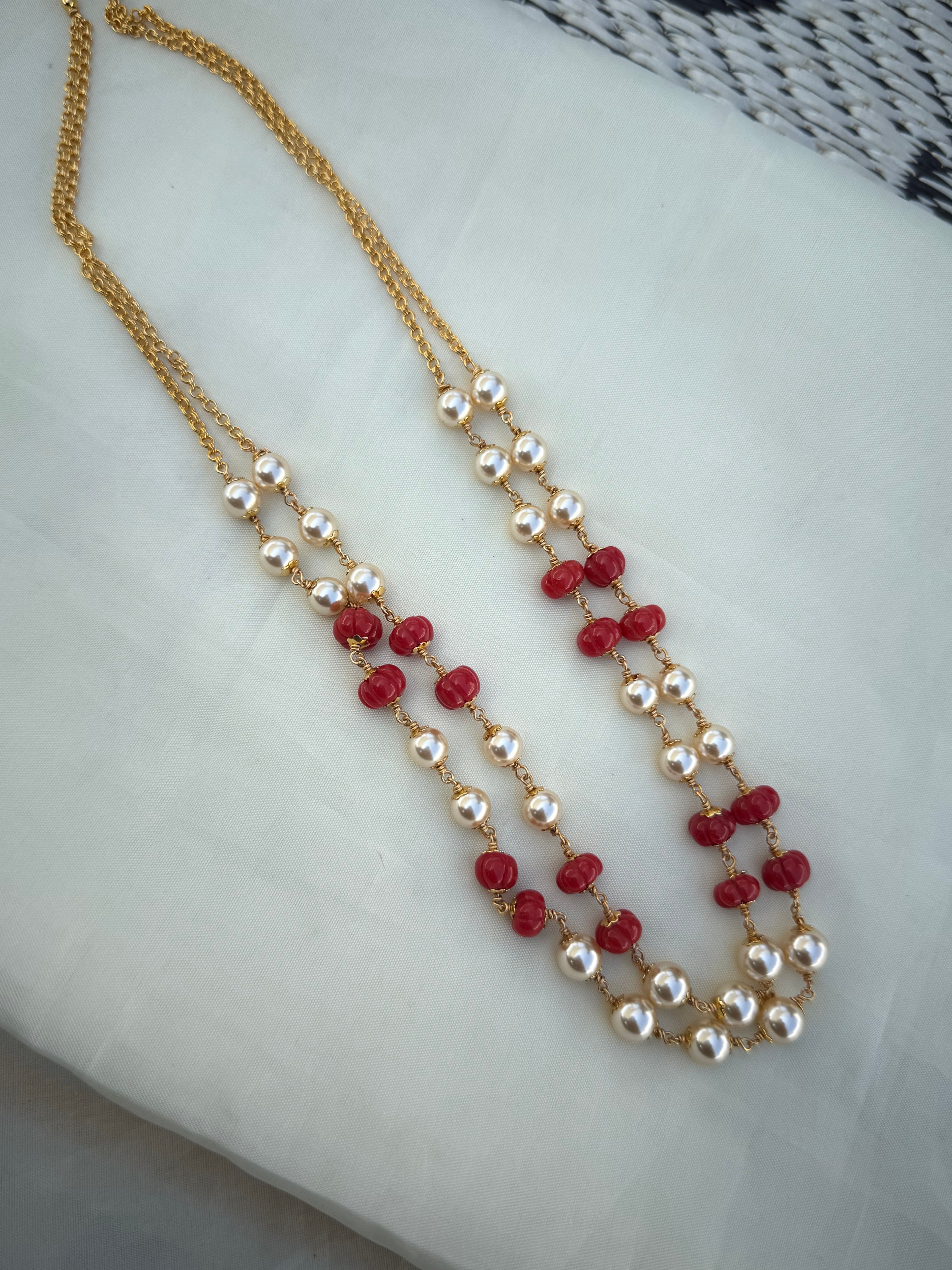 Bb229 2 lines pumpkin coral beads