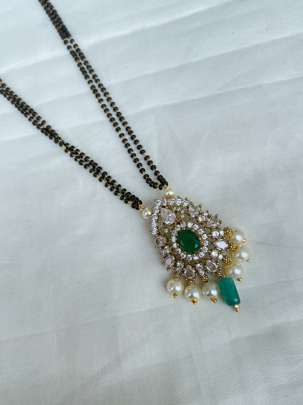 Cz green 2 lines short blackbeads