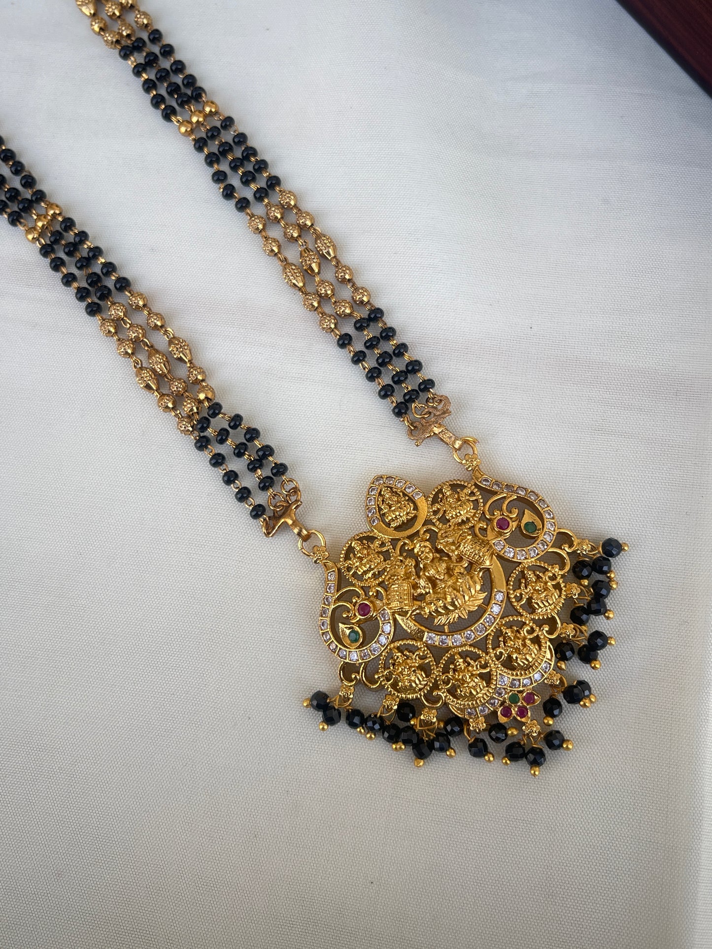 Long blackbeads with Lakshmi Devi pendant