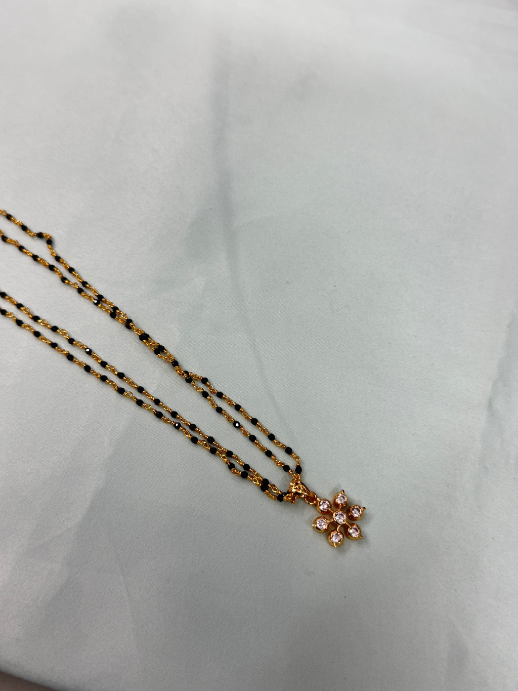 Bb221 micro gold 2 layers black bead with Panchaloham pendant 18inches black beads