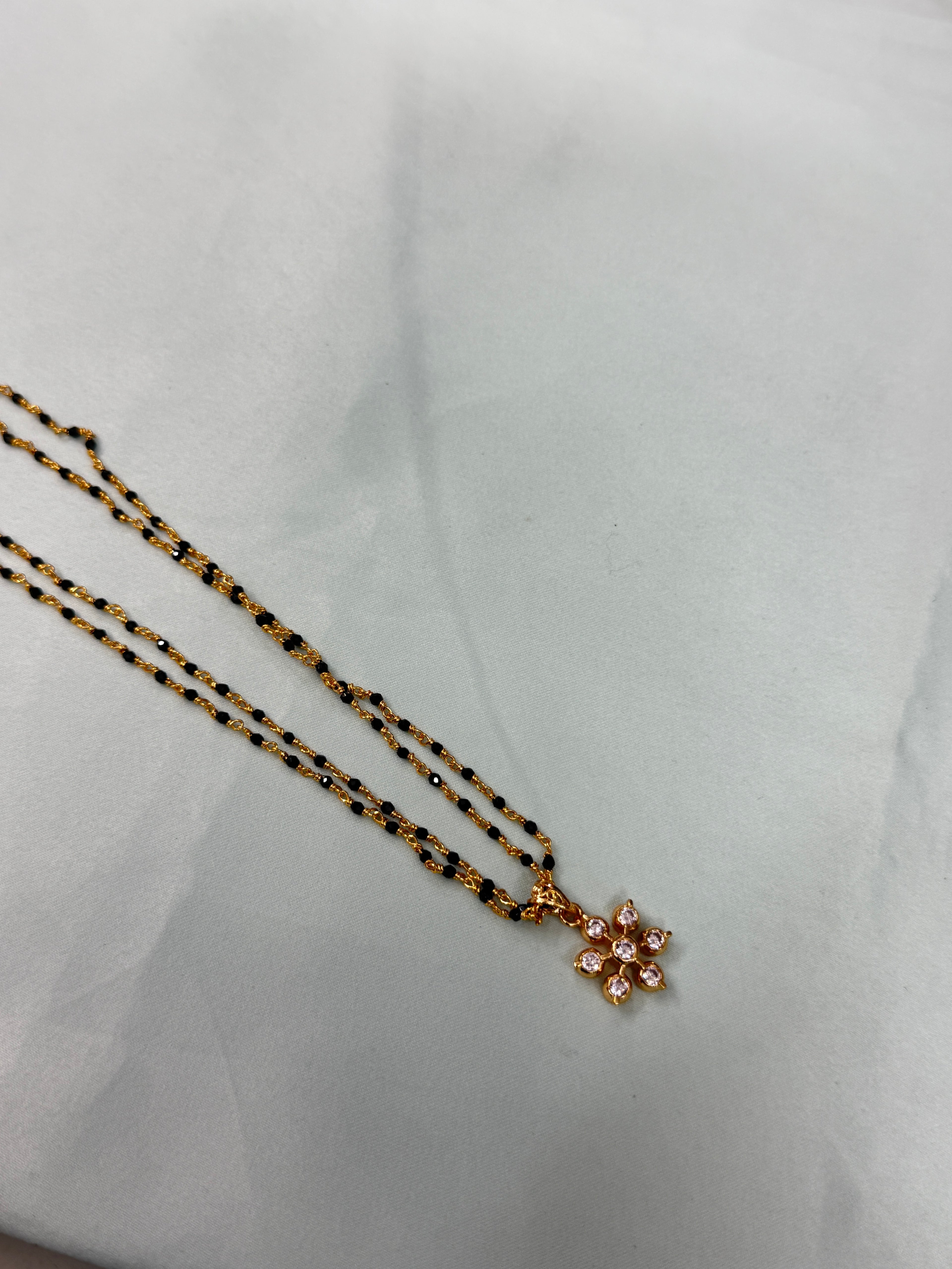 Bb221 micro gold 2 layers black bead with Panchaloham pendant 18inches black beads